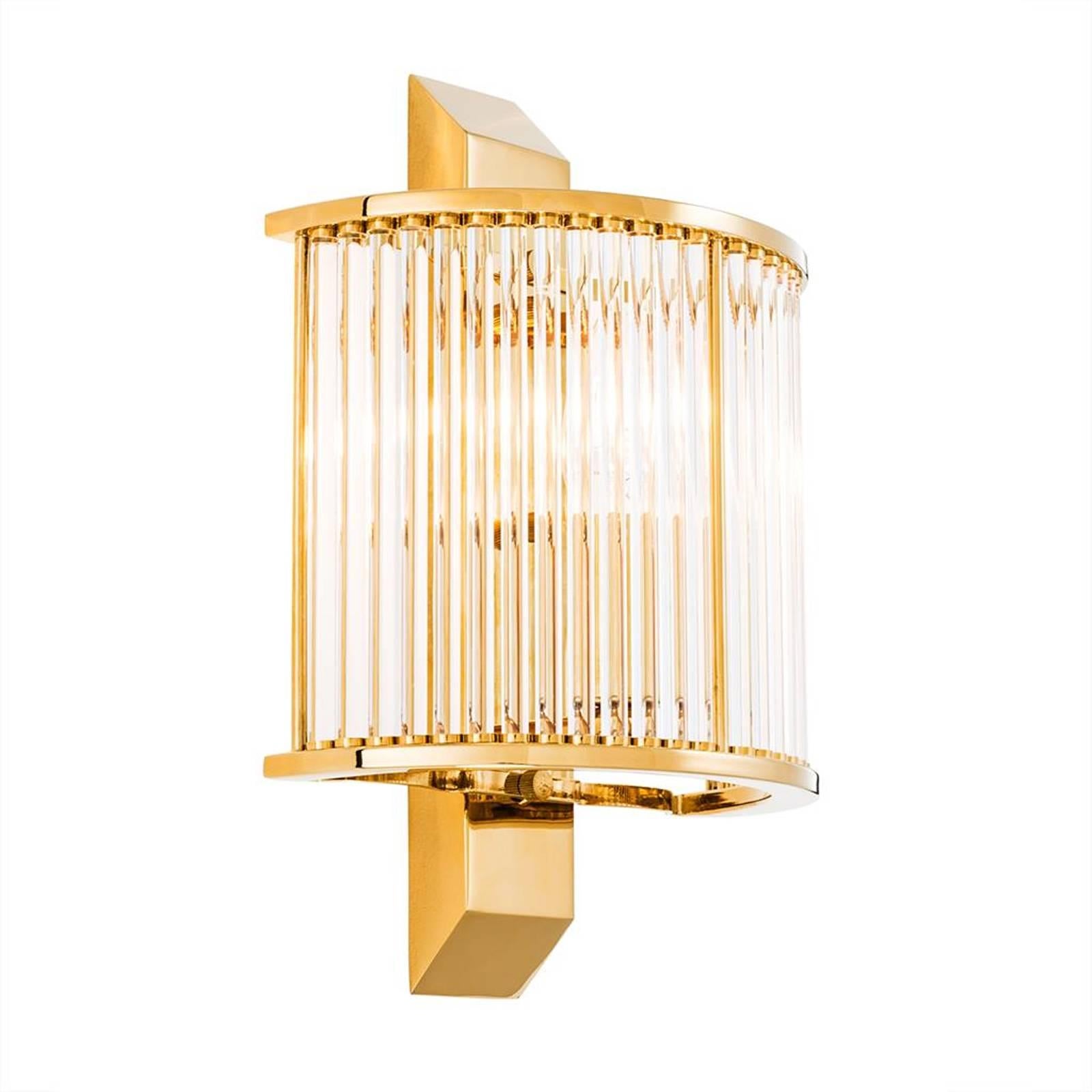 Wall lamp grand corridor with structure in gold finish and
with clear glass. One bulb lamp holder type E14, max 40 watts.
Bulb not included.
Also available in polished stainless steel with clear glass.
 
