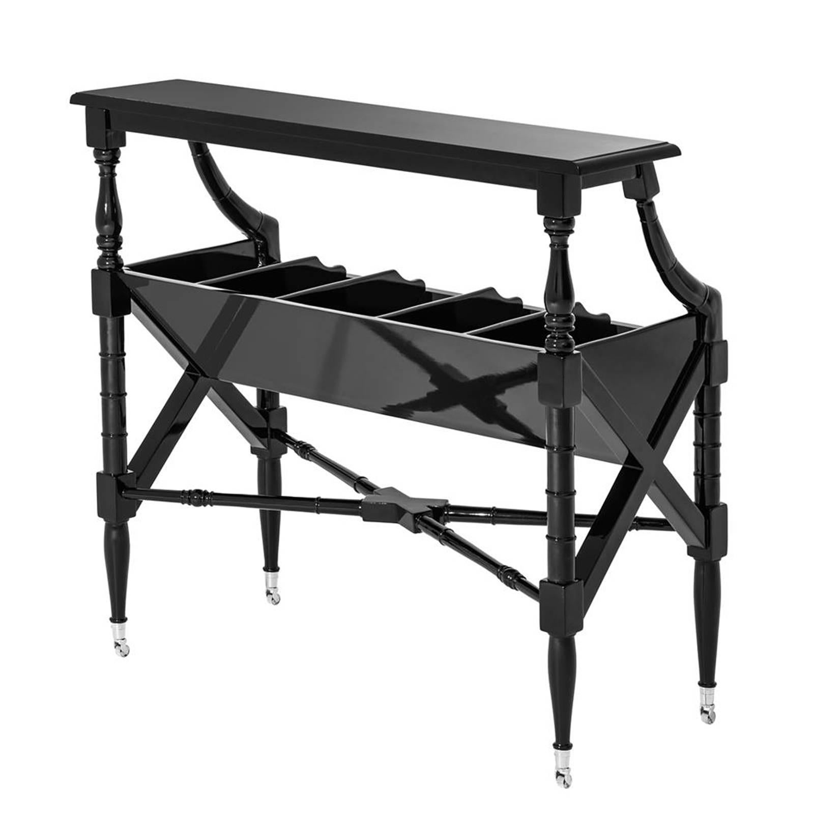 Book Rack Harper with structure in solid mahogany wood
in black lacquered finish. With nickel hardware.

 