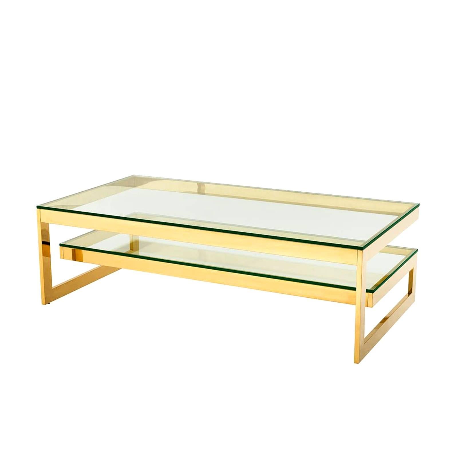 Coffee table double top with structure in gold
finish with 2 clear glass top.
Available with structure in bronze finish and 2
clear glass top.
Also available in console and side table double top.
