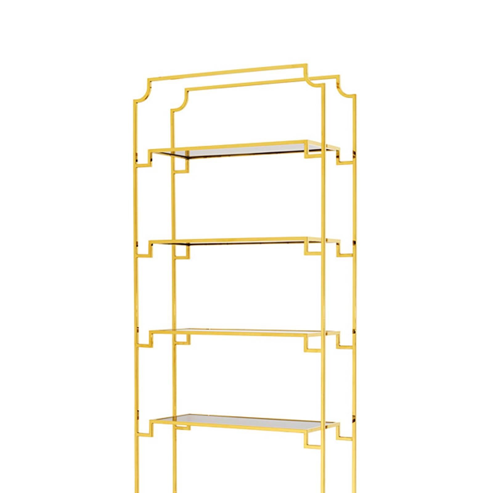 Bookshelves Stantord with structure in gold finish
and six shelves in smoked glass.

