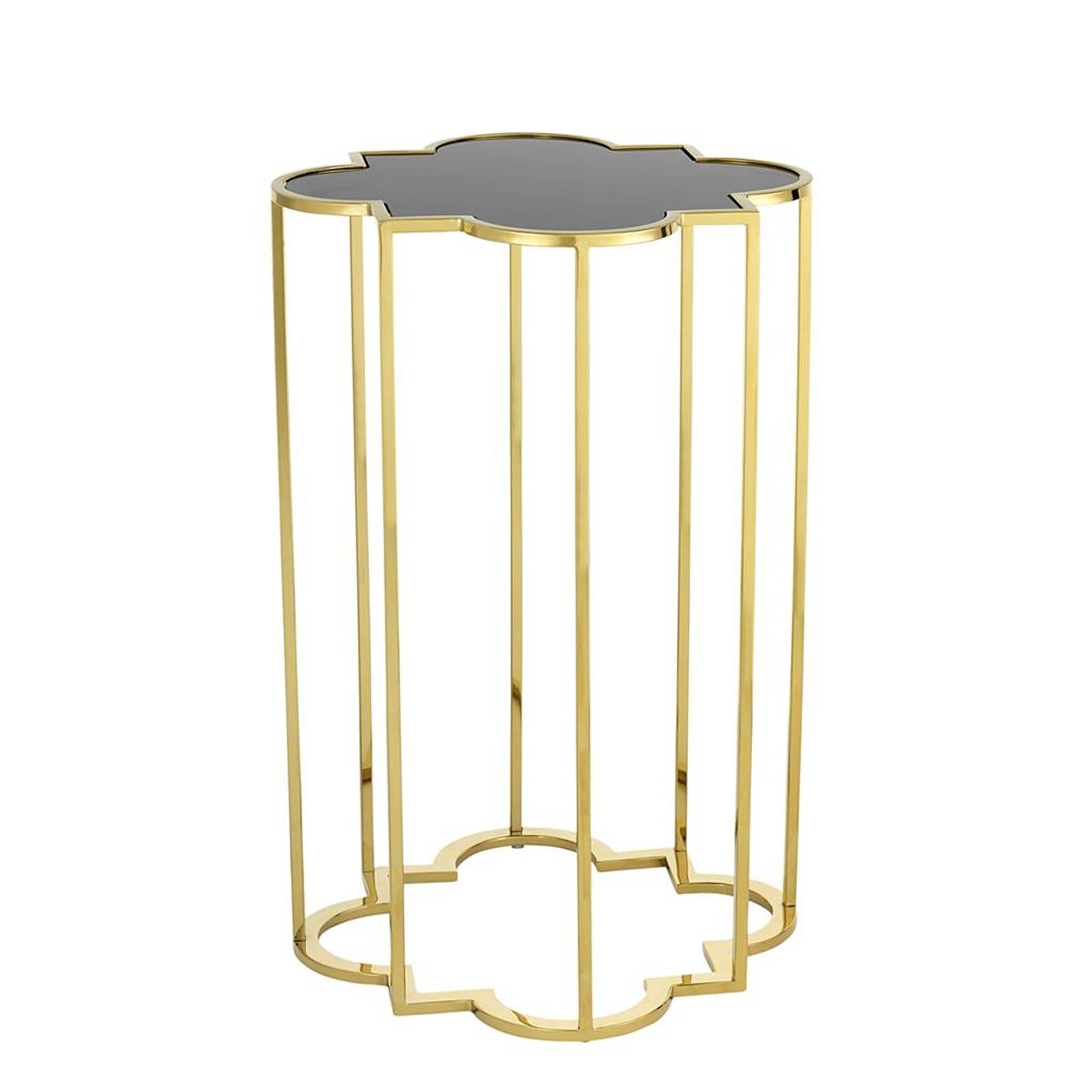 Side table clover set of two with structure in gold
finish. Tops in tempered smoked glass.
Measure: A/ L 40 x D 40 x H 60cm.
B/ L 30 x D 30 x H 55cm.
Also available with structure in polished stainless
steel finish with tops in tempered smoked