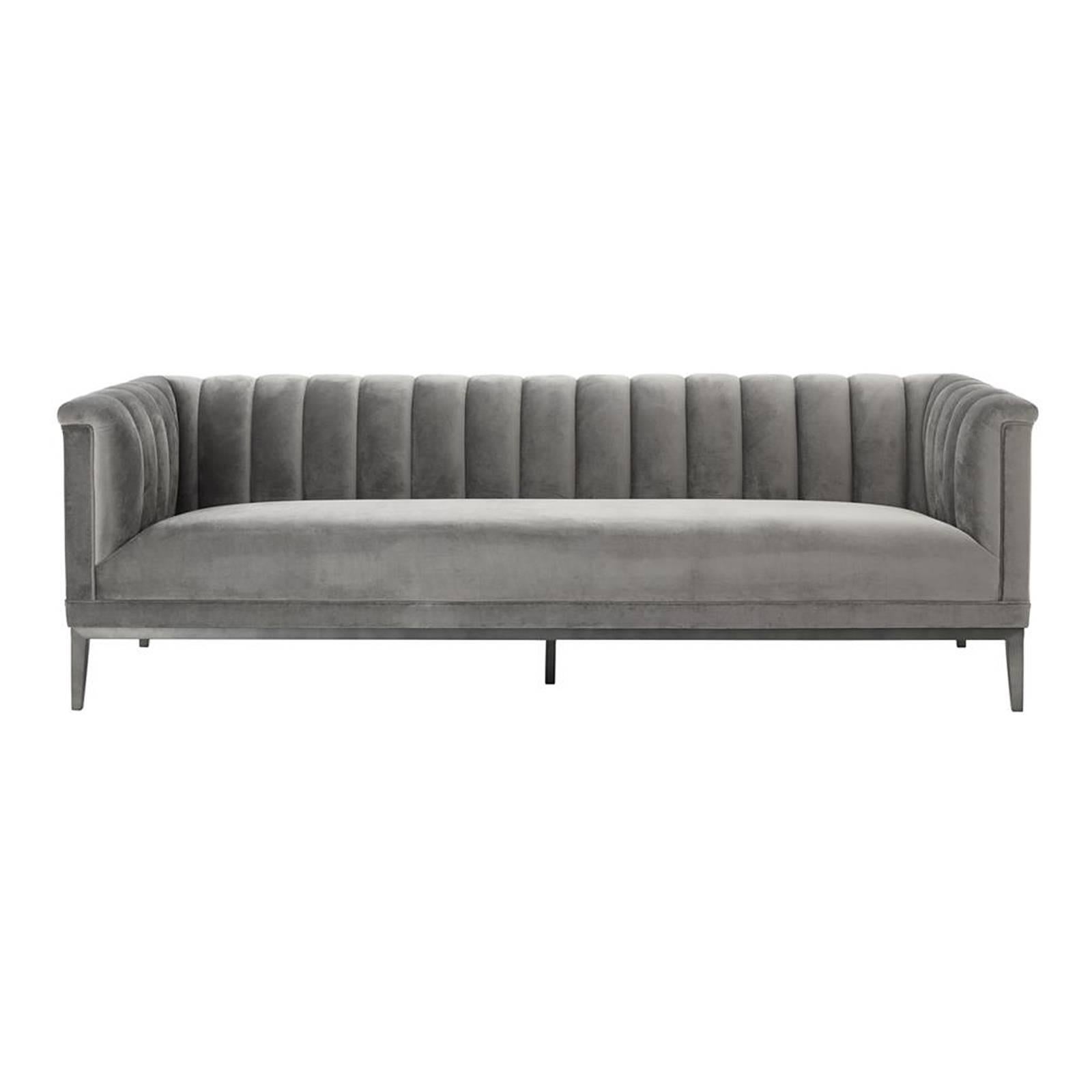 Sofa Stepper upholstered with porpoise grey
fabric. With solid wood structure and gunmetal 
base. Fabric with fire retardent treatment.
