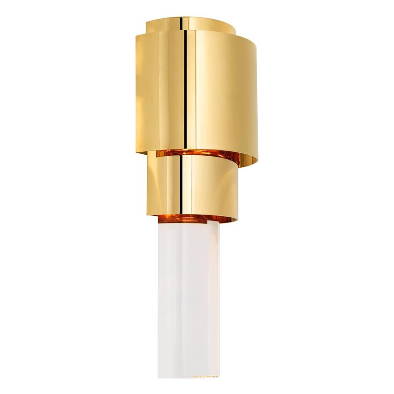 Wall lamp royale with crystal glass base and 
structure in polished stainless steel in gold finish.
Also available with crystal base and structure in
nickel finish or in bronze finish.
