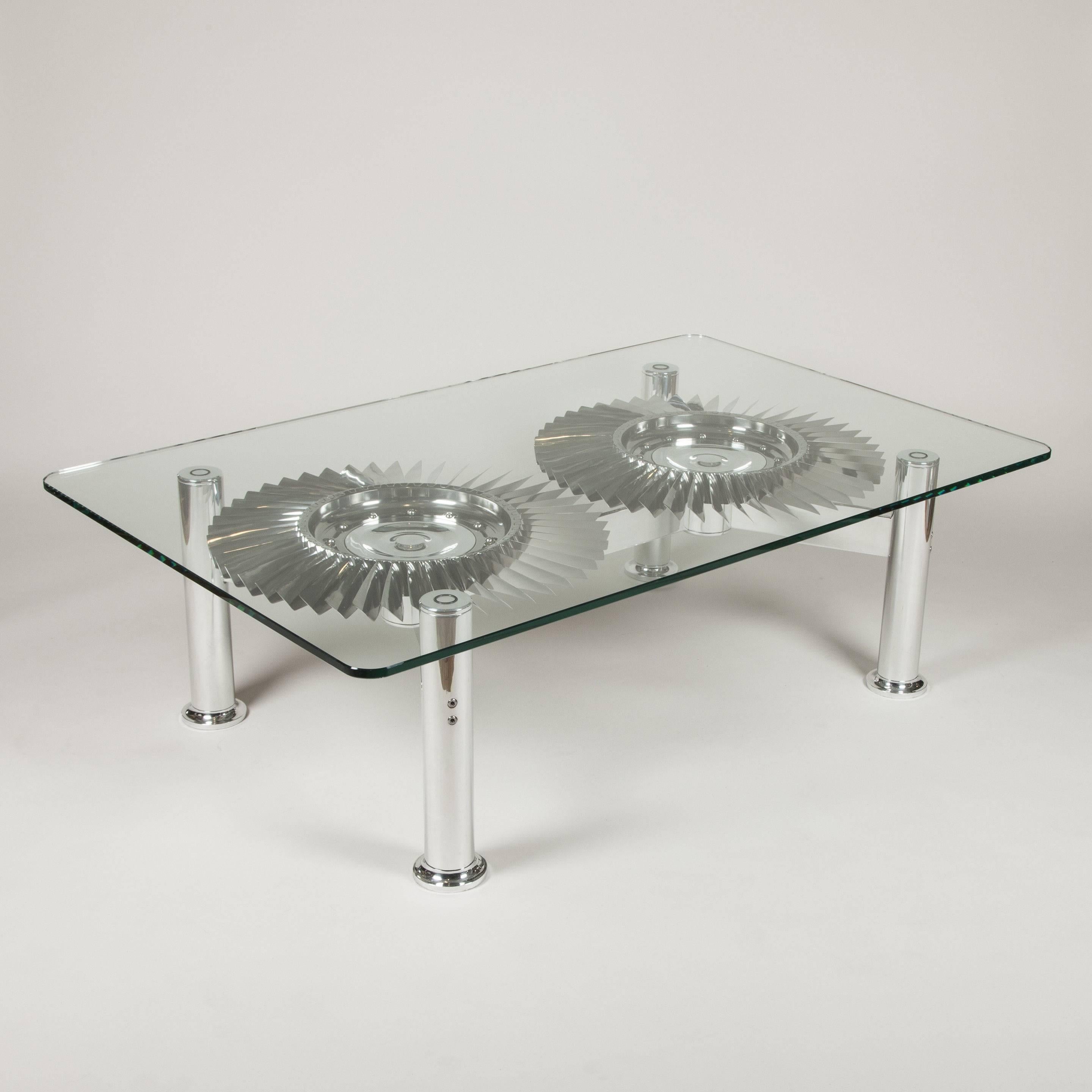 Coffee table double turbine Rolls-Royce from Pegasus fighter engine.
Pegasus 105 HP turbines in titanium from Pegasus fighter turbofan engine
of the harrier family aircraft designed by Bristol Siddeley. Manufactured by
Rolls-Royce this modern