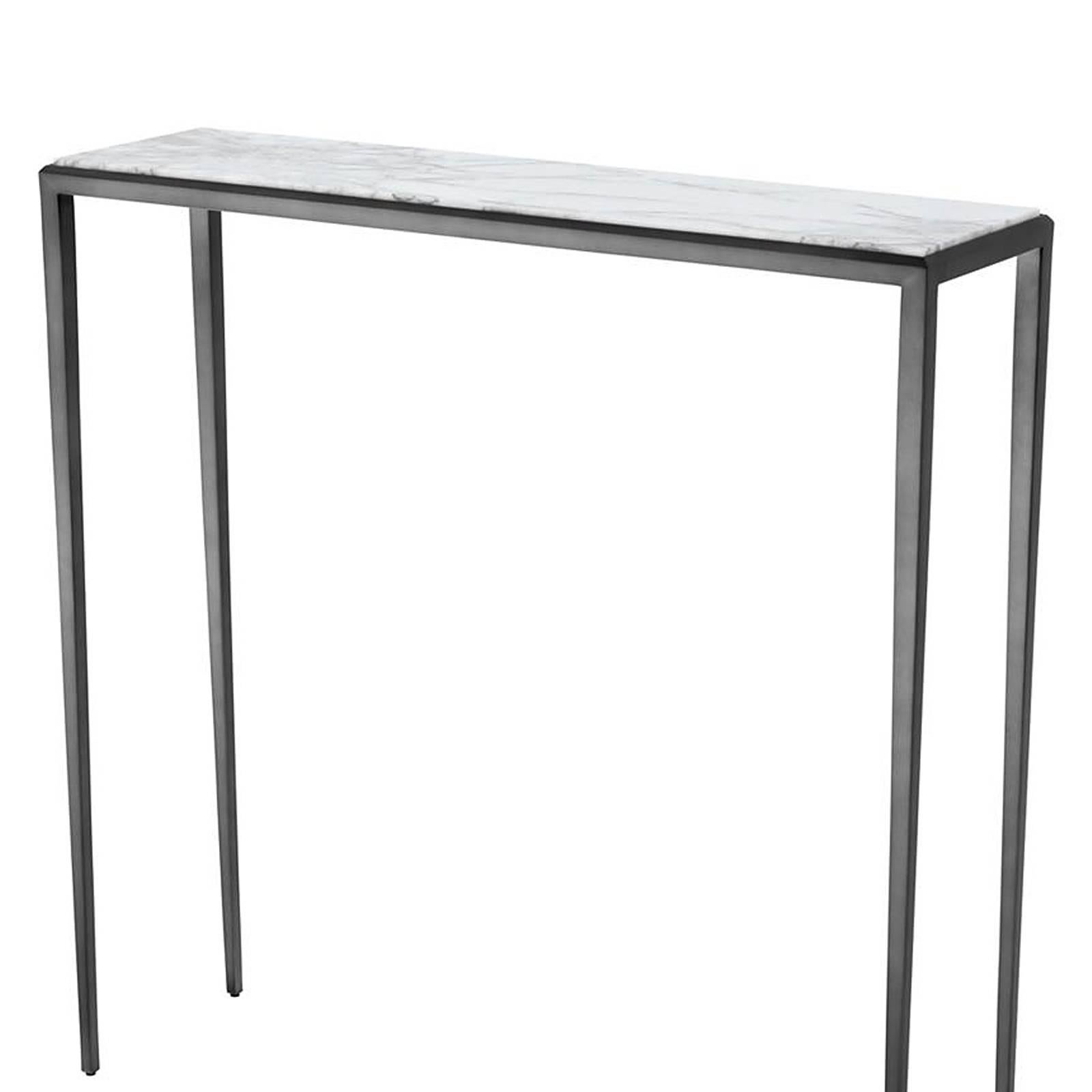 Console Table Leggy with structure in solid 
bronze finish. With white Lilac marble top.
Also available with brown marble top.
Also available in gold finish structure with 
white Lilac marble top.
Also available in Coffee Table Leggy or
Side Table