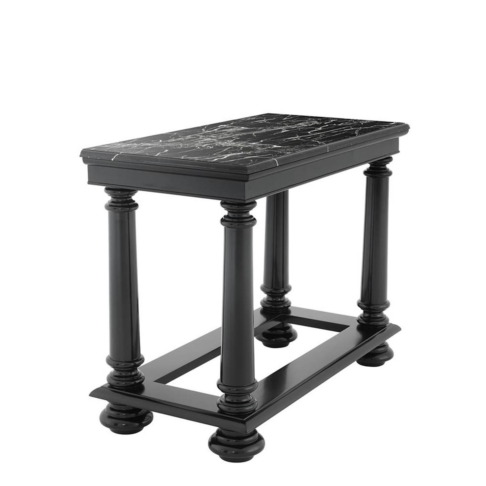 Console Table Harth Medium with structure in solid mahogany
wood. With black waxed finish. With black marble top.
Also available in Console Table Harth Large and Console
Table Hart Moon with black marble top.
