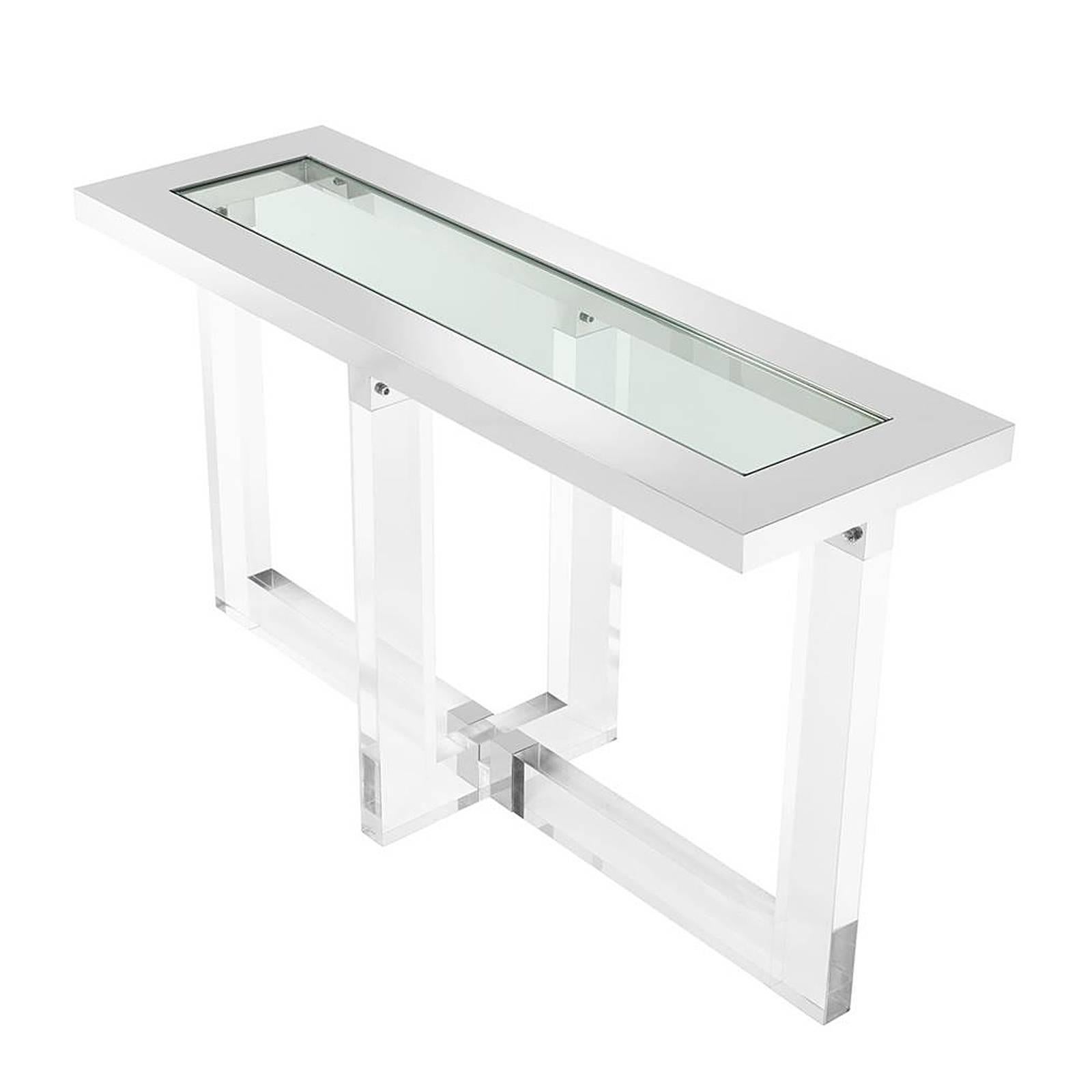 Console table Shiffrin with structure in polished stainless 
steel and clear acrylic. With clear glass top.
Also available in rectangular or square coffee table or in
side table.