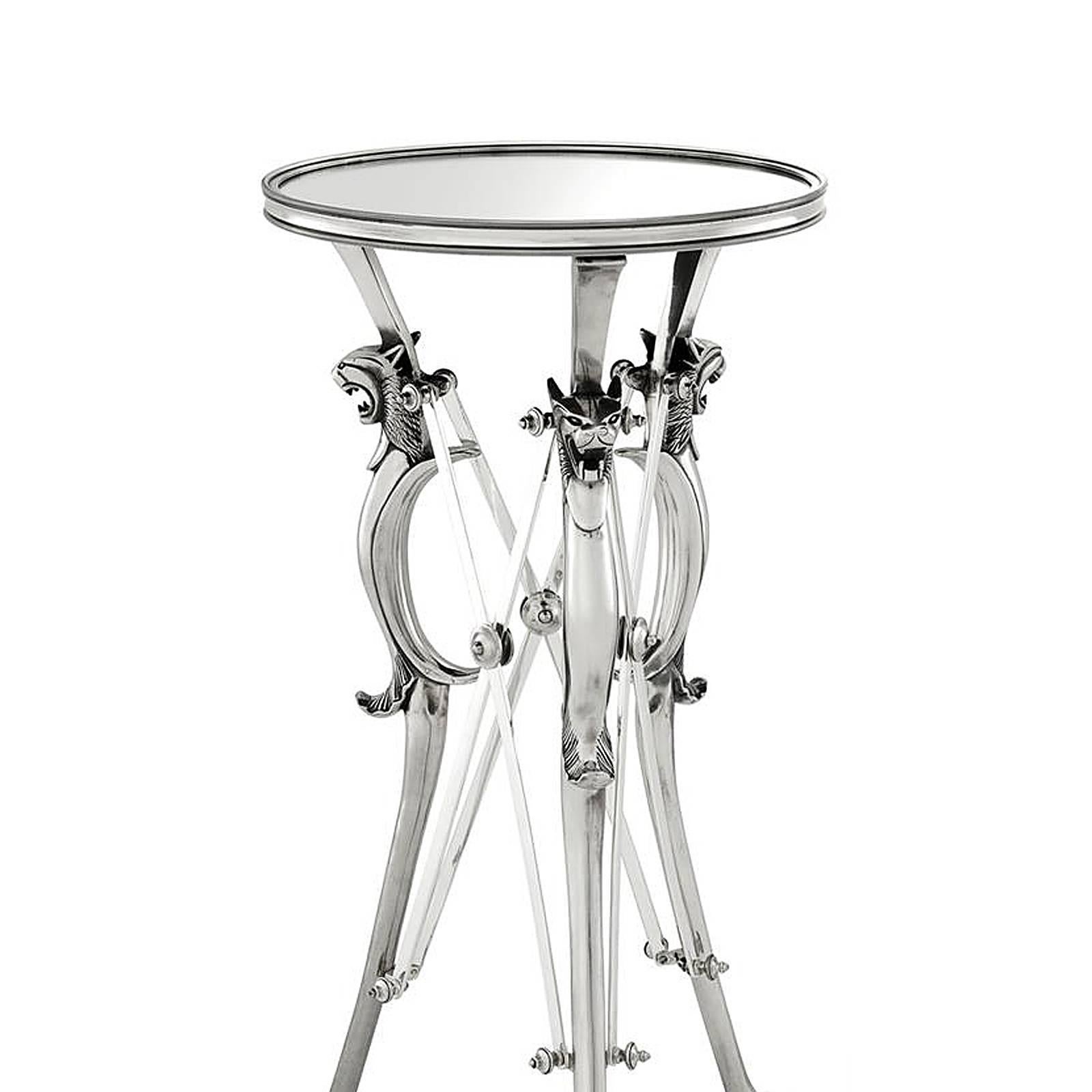 Column Feline with structure in antique 
silver plated finish. With mirror glass top.
Also available in side table Feline in
antique brass finish or antique silver finish.
