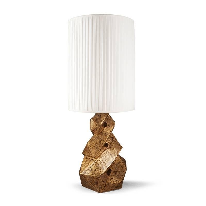 Table lamp Artemus hand sculpted on solid wood
in antique gold finish. With off-white plited shade.
With dimmer switch and three way switch, CE standard.
Also available with black plited shade.
 