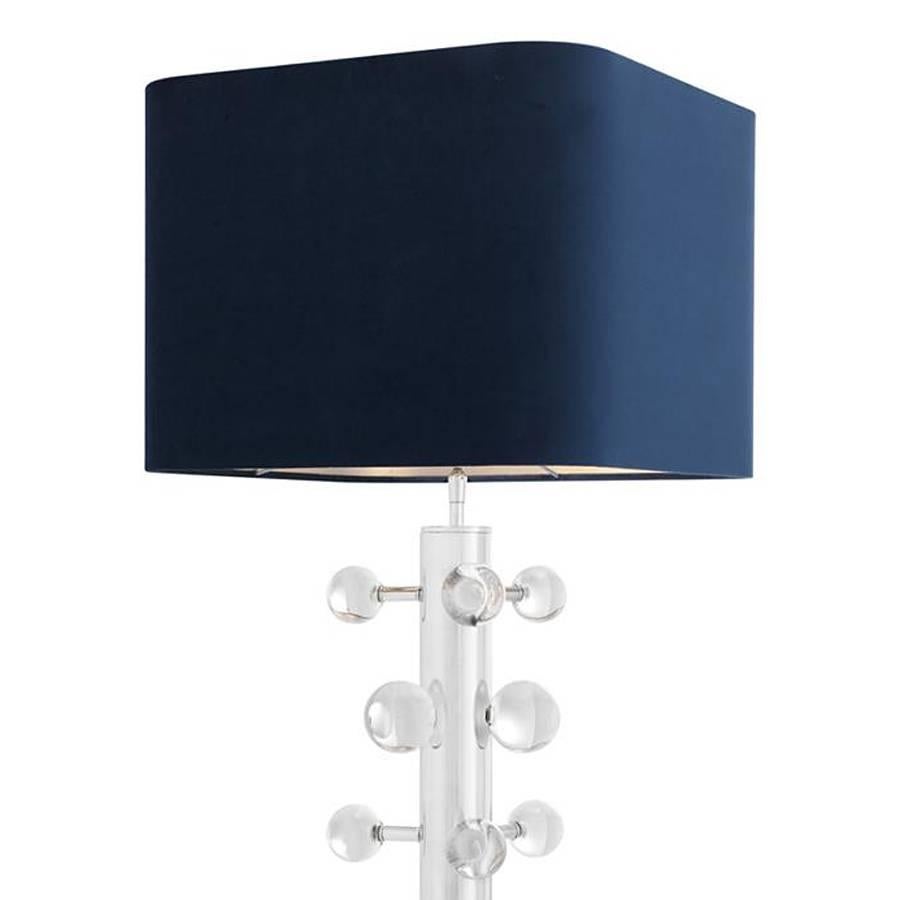 Table Lamp with structure in nickel finish,
with crystal glass bubbles and including
blue velvet shade. 1 bulb, lamp holder
type E27, max 40 watt. Bulb not included.
Also available in gold finish with brown
velvet shade.
