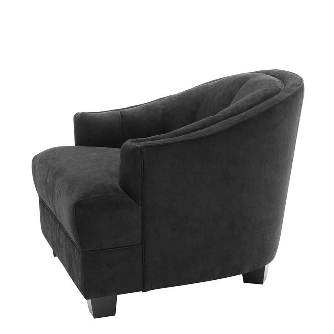 Armchair Karam with structure in solid wood,
upholstered in black velvet, fire retardant treatment.
With black wooden feet.
Also available in ecru velvet. 
 