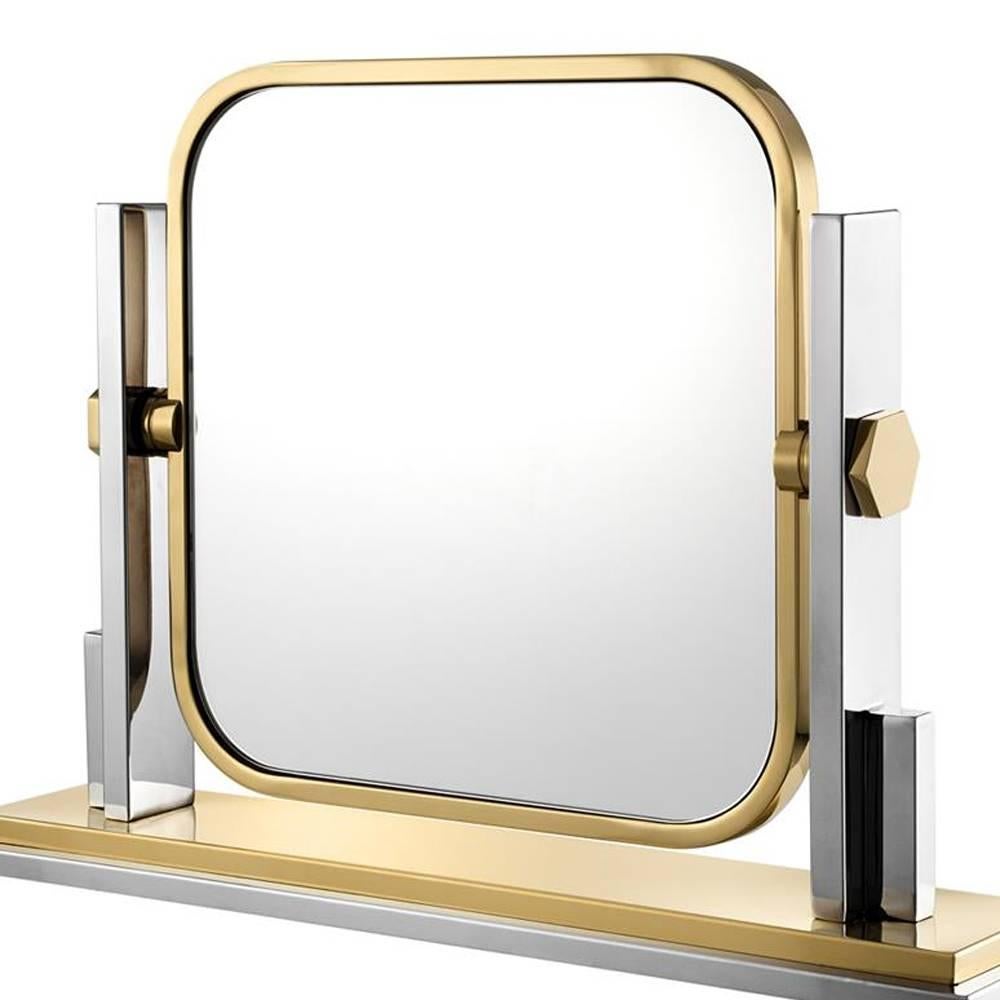 Table mirror majesty with structure in polished
stainless steel in gold finish. With removable
mirror glass.

  