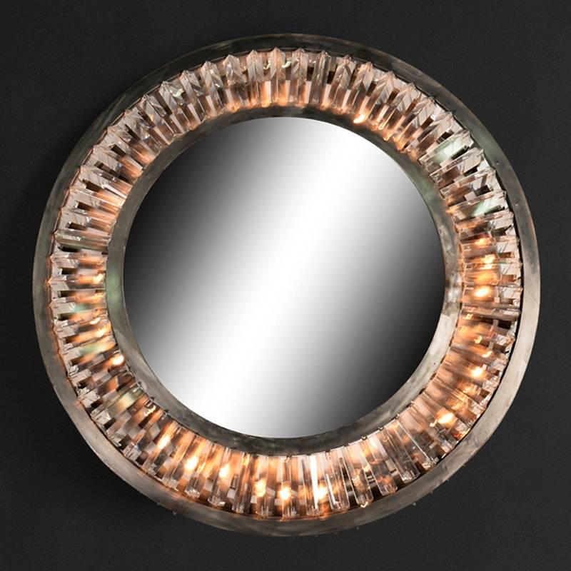 Runder Spiegel im Art Deco Stil mit funkelnden Schnitzereien
kristallglas zwischen zwei Metallringen.
      