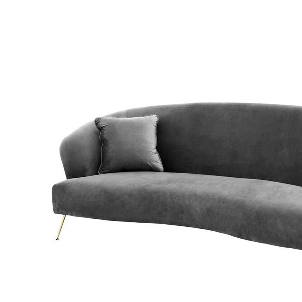 Sofa porpoise with solid wood structure upholstered
with grey velvet fabric with fire retardant treatment.
With brass feet.
 