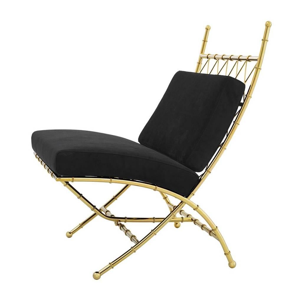Folding chair tropic with structure in vintage brass
finish. Upholstered with black velvet fabric, with
fire retardant treatment.

 