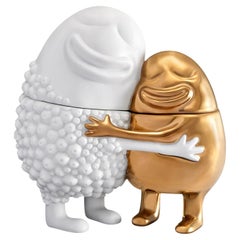 Abrazo Caja de Oro