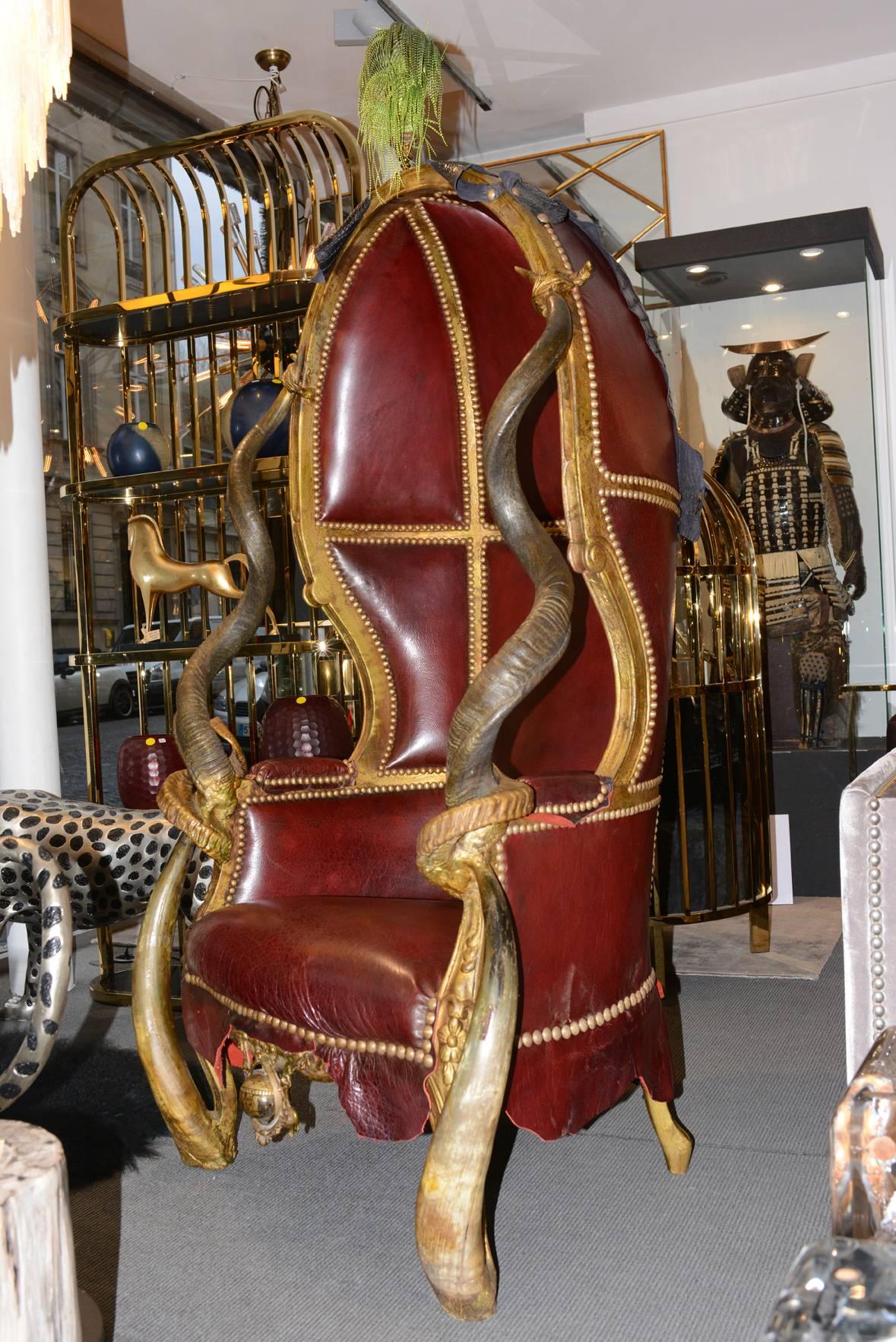 Alligator High Armchair with real Kudu, Zebu and Aries Horns.
Genuine Calf Leather in Red Color and Back with real Alligator Skin.
