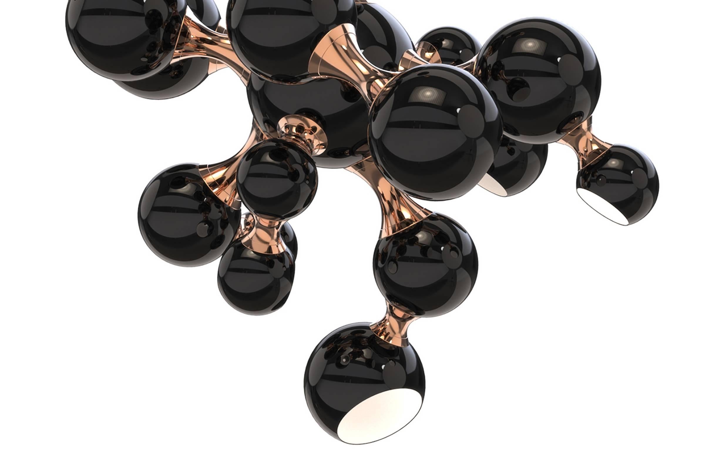 Chandelier black pearl with aluminium and brass structure
in copper finish with glossy black globes.
Shades in glossy black and gold powder paint inside.
8 x G9 bulbs included.
Also available in with aluminium and brass structure
in gold plaetd