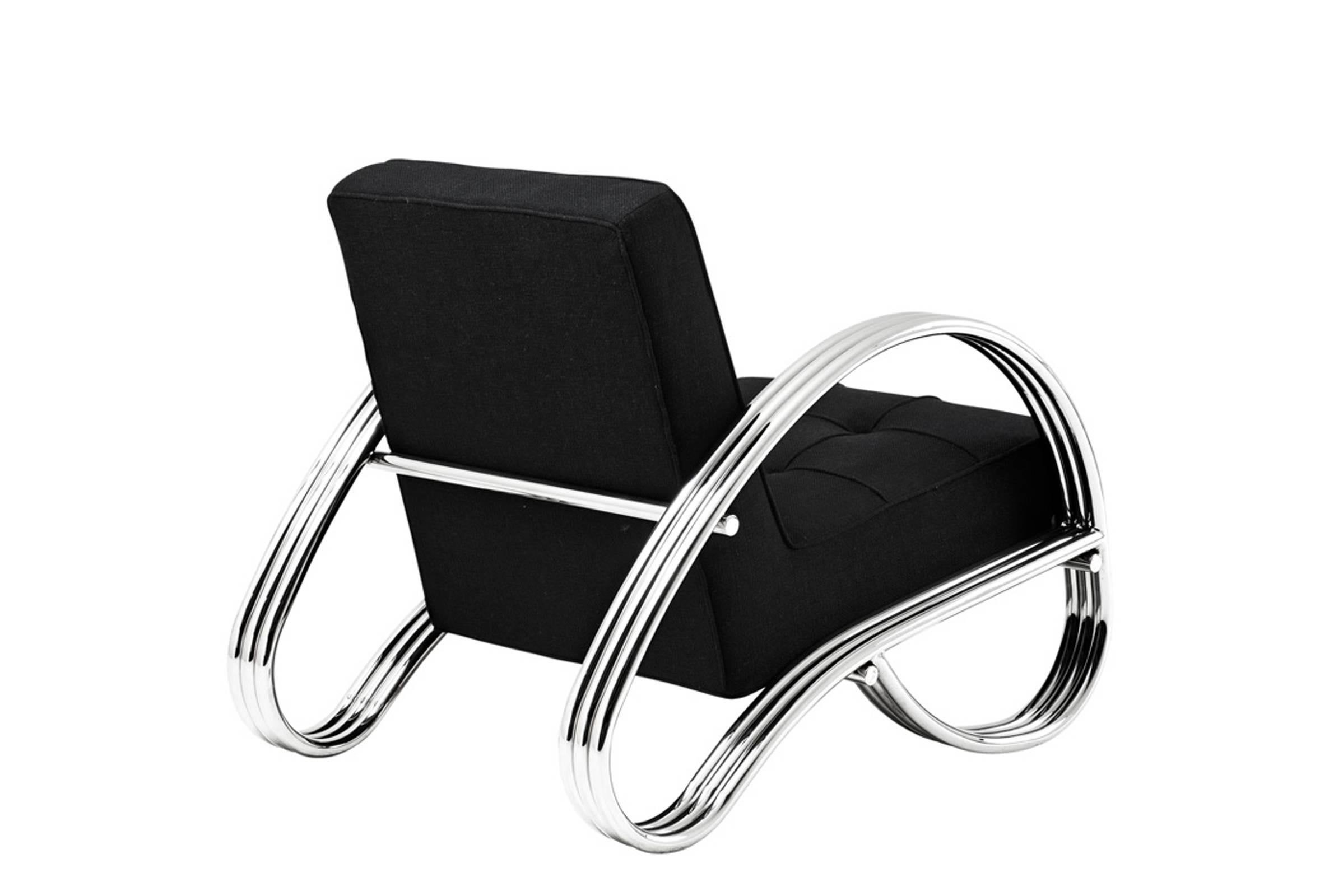 Cadillac armchair with polished stainless steel structure
and panama fabric. Made in 2018.
