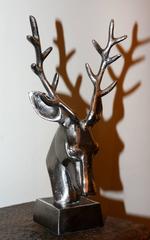 Trophée de chasseur cher en fer sur socle