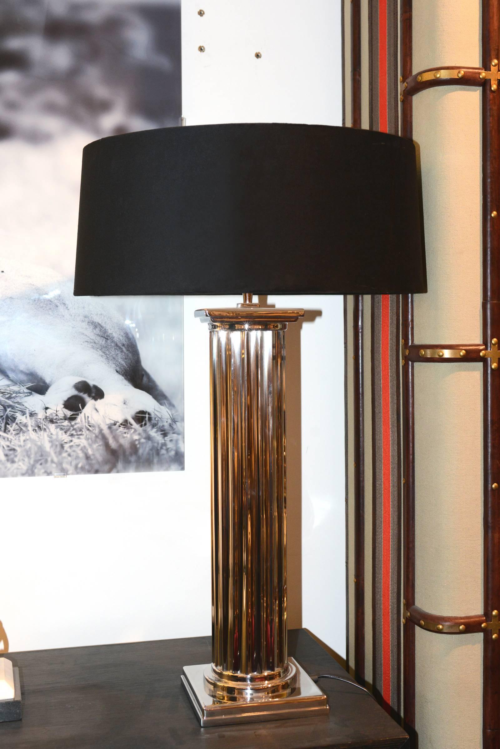 Table lamp New York in polished nickel
with black velvet lampshade.
    
