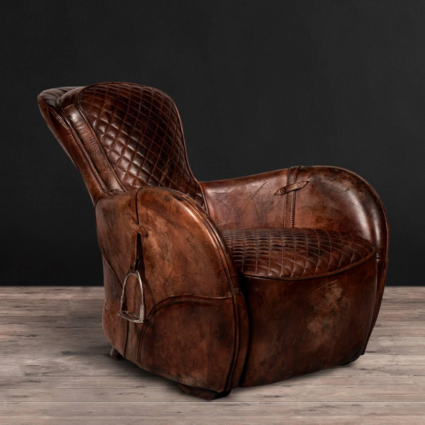 Armchair saddle old brown in 
vintage brown leather with stirrups
and handcrafted leather.
