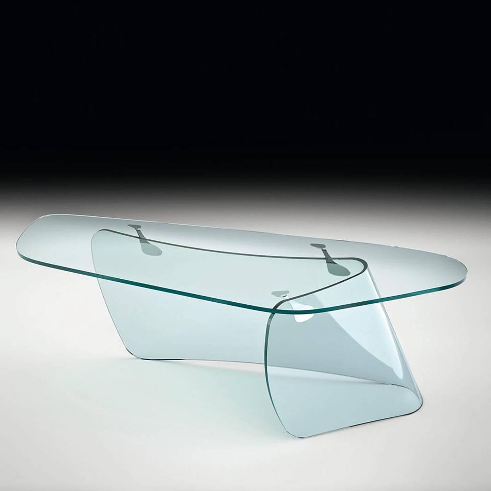 Desk Absolut composed of a curved transparent glass base
19mm and a clear glass top 15mm with fastening plates in 
polished stainless steel.
Available on request in:
L220xD80xH74cm, price: € 10,700.00
L250xD91xH74cm, price: € 11,500.00

