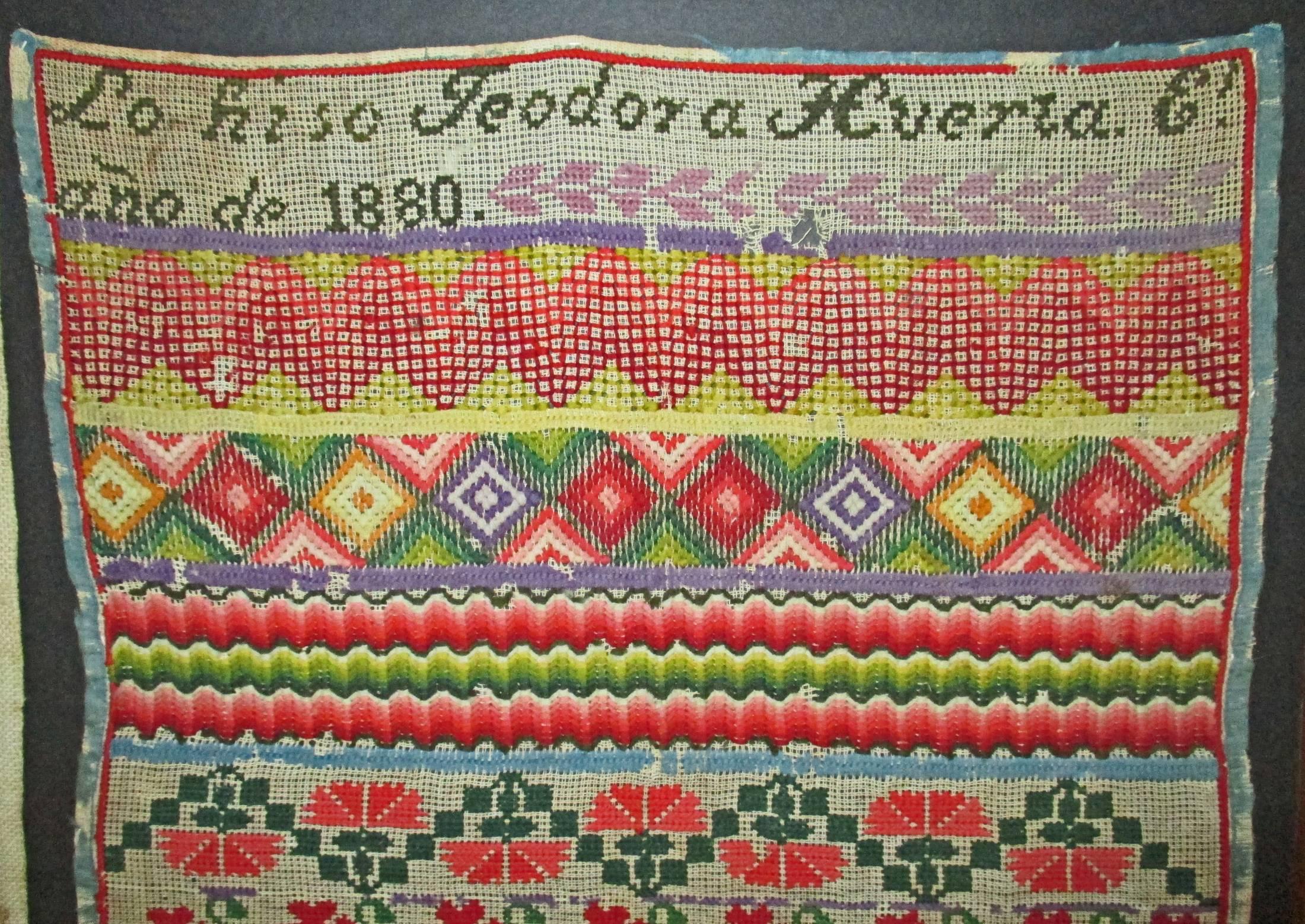 A rare find. These samplers were typically done by young girls in the monasteries of 19th century Mexico and did not leave the church so they are truly hard to find on the market. This one is unframed. The girls name was Teodora Huerta E. and this
