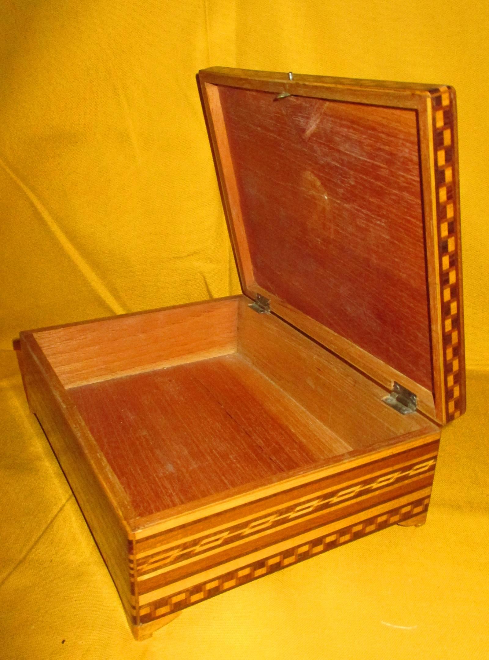 The most famous town in Mexico for rebozo making, also has a history of making some beautiful inlaid wooden boxes. These were made specifically to store the rebozos. No other area made these designs in marquetry. A woman of culture and class might
