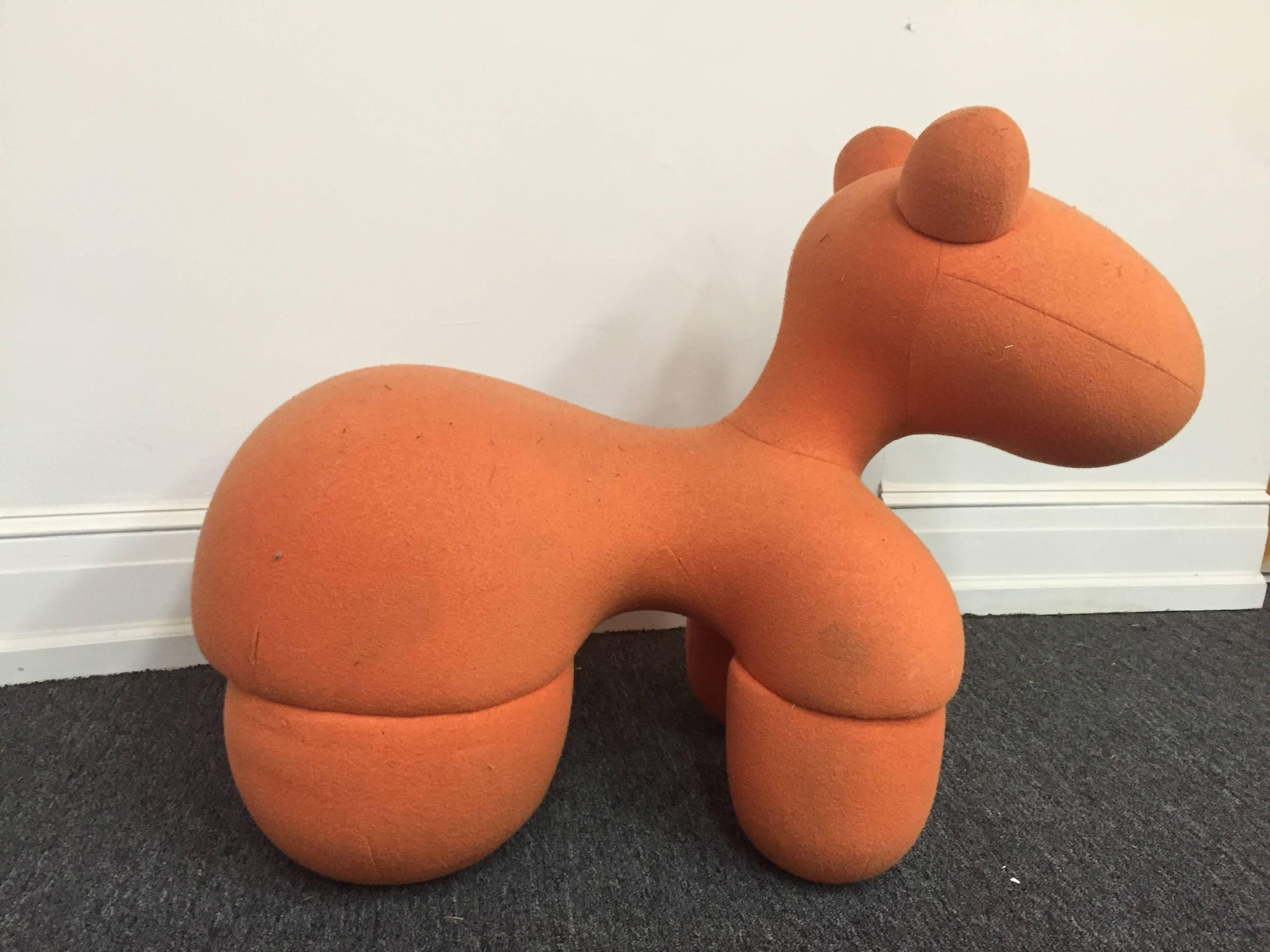 A 1970s Eero Aarnio Asko sculptural orange pony chair made in Finland.
     
   