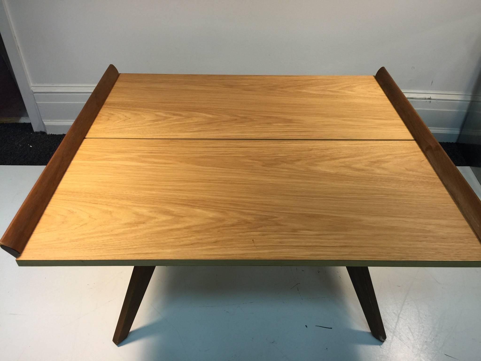 A gorgeous George Nakashima for Knoll splay-leg table originally designed in 1947. Signed and dated on the underside of the tabletop.

 