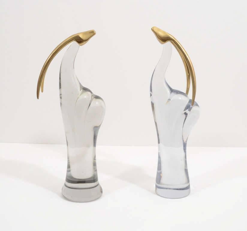 A pair of gorgeous modern Murano glass gazelle sculptures with brass heads and horns, circa 1970.