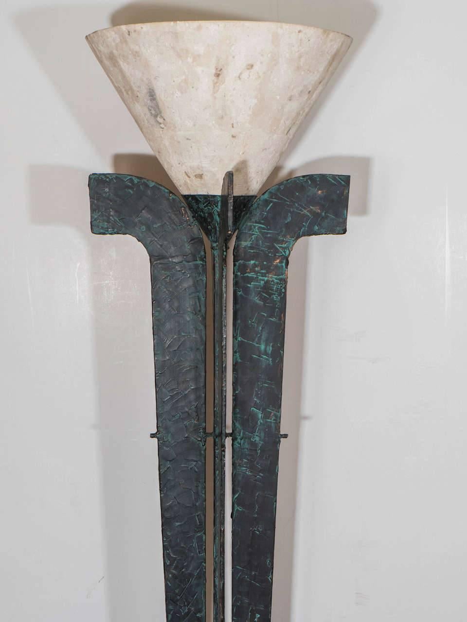 An amazing French Art Deco style torchiere or floor lamp in patinated bronze with a stone shade, circa 1970.