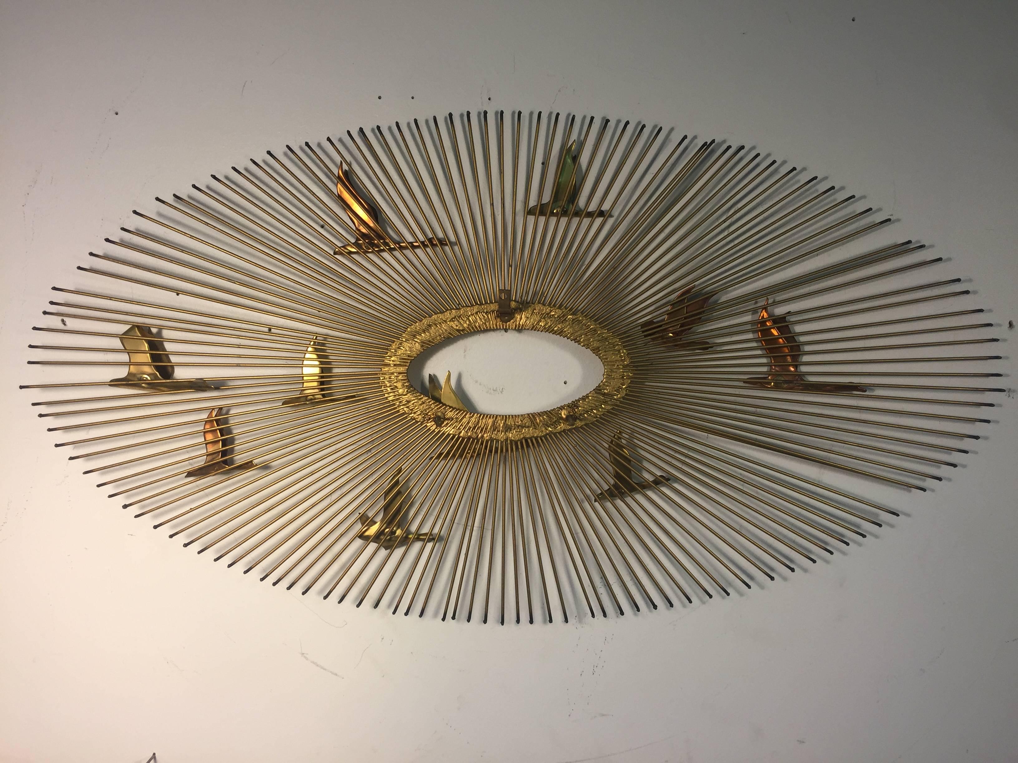 Beautiful Curtis Jere Mixed-Metal Starburst Wall-Mounted Sculpture with Birds In Good Condition For Sale In Mount Penn, PA