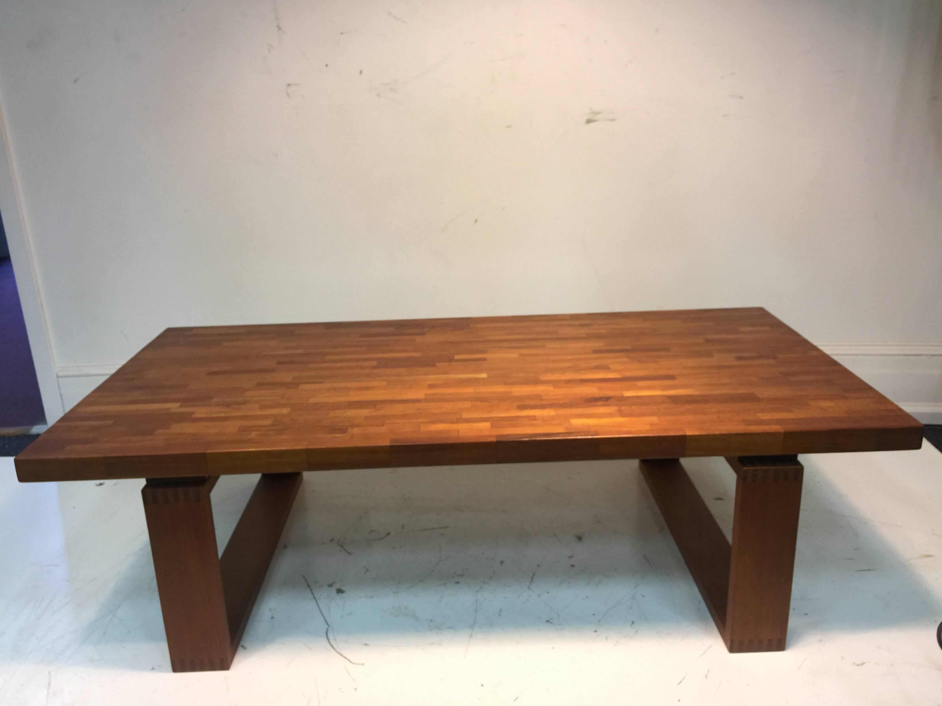 A terrific Scandinavian Modern bench or coffee table in the manner of Norwegian designer Torbjorn Afdal, circa 1970. Good vintage condition with age appropriate wear.