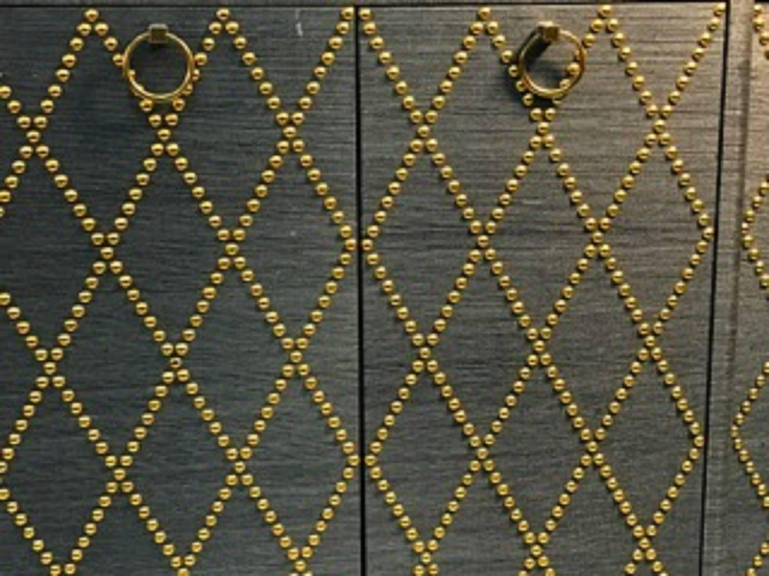 Fabulous Grasscloth Gold Studded Cabinet in the Manner of Tommi Parzinger In Good Condition For Sale In Mount Penn, PA