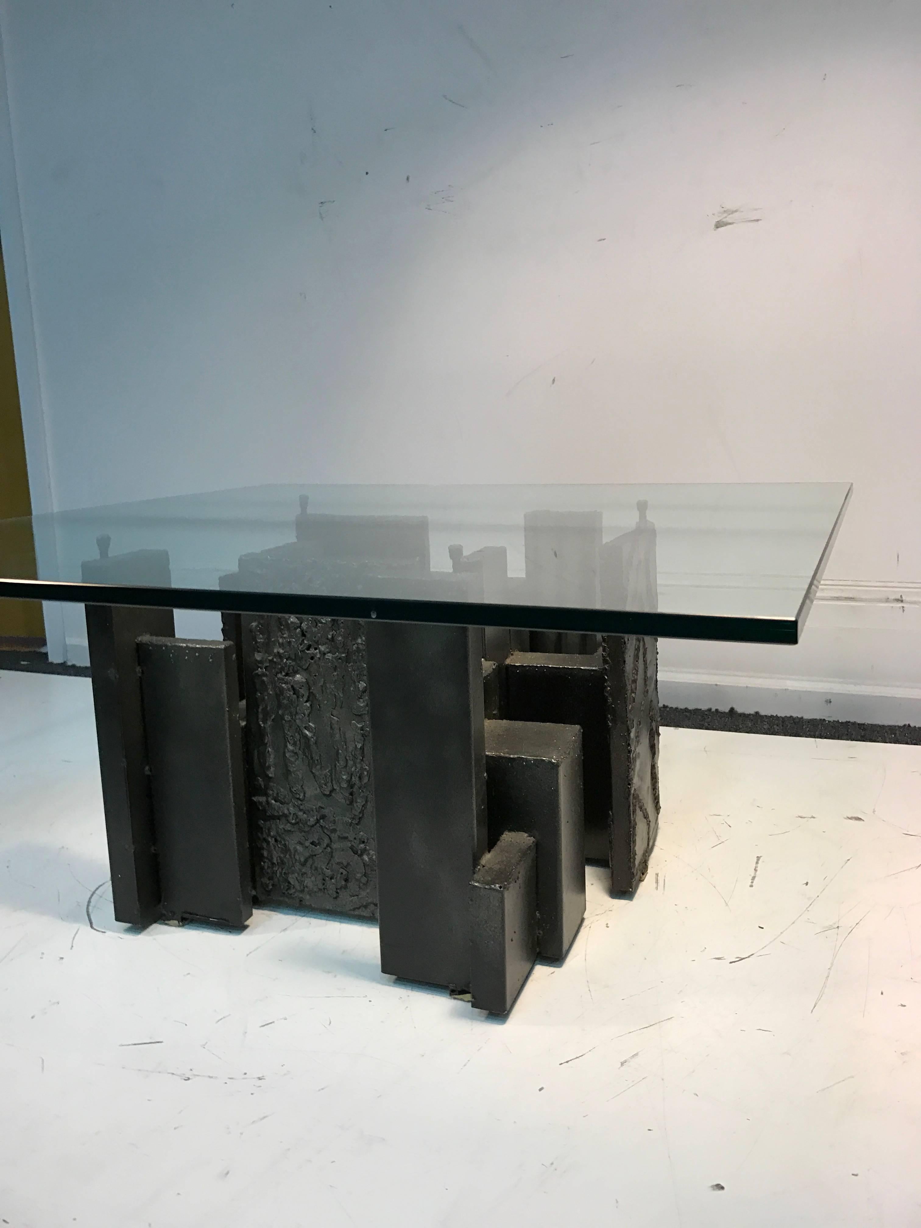An incredible sculpted Paul Evans for Directional coffee or cocktail table in welded steel with a Brutalist bronze finish, circa 1970s. Good vintage condition.

Base alone measures: 24 x 24 x 15