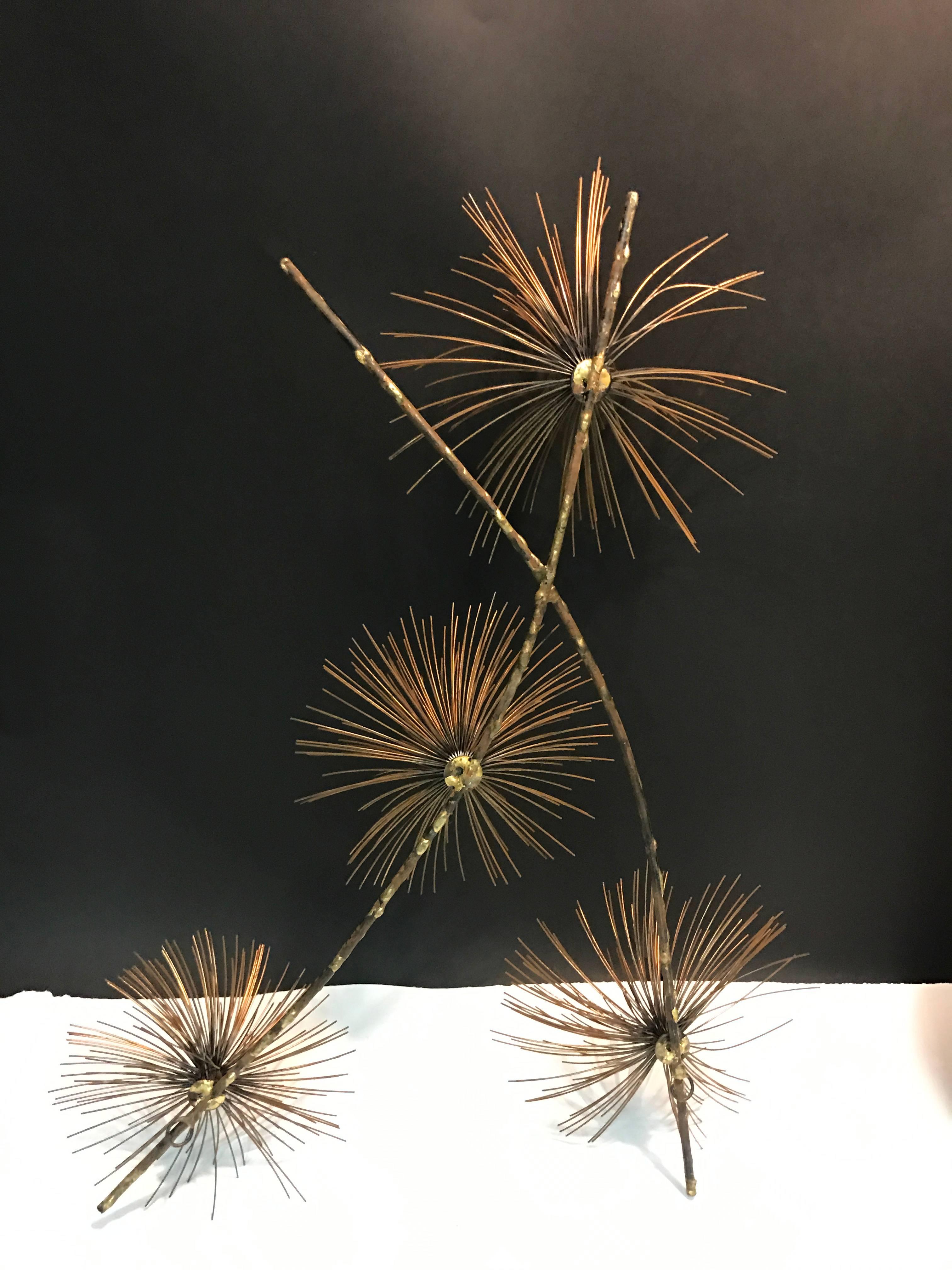 A beautiful brass Curtis Jere pom pom wall-mounted sculpture, circa 1970. Good vintage condition with age appropriate wear.