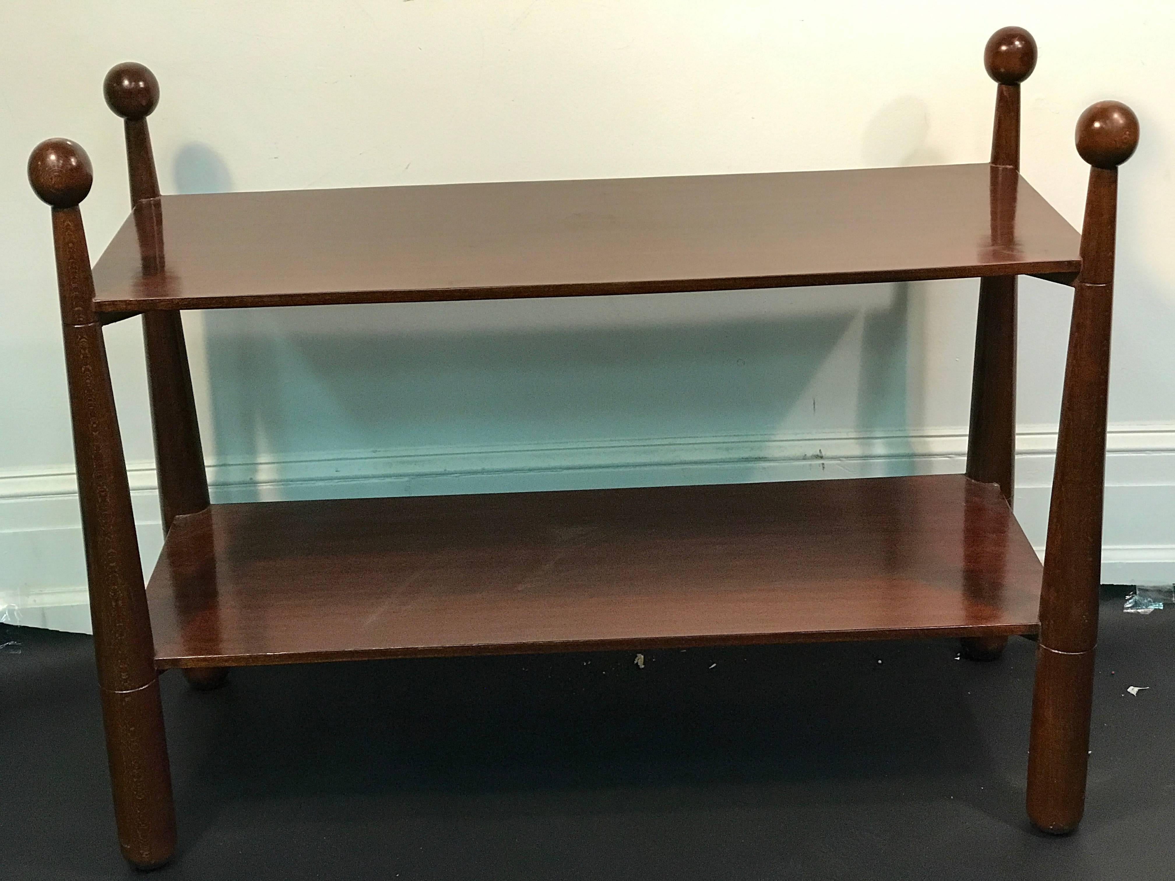 An unusual two-tier console table, or side table with ball accents in the manner of Jean Royère. Good vintage condition.