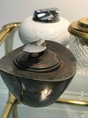 Exceptional Collection of Ten Vintage Lighters Ranging in Style and Size