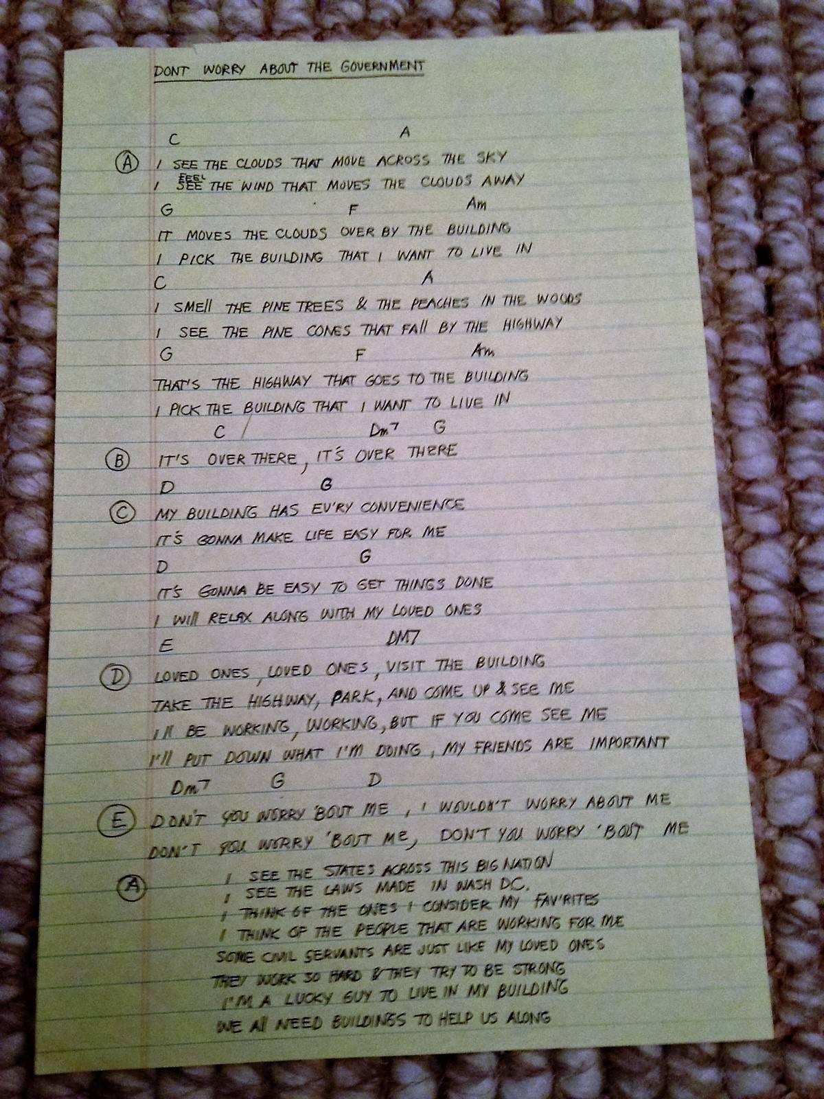 Handwritten lyrics by David Byrne, circa 1990s. Written on legal size lined yellow paper. This is an important song from the talking heads repertoire. We can have this professionally framed if desired.