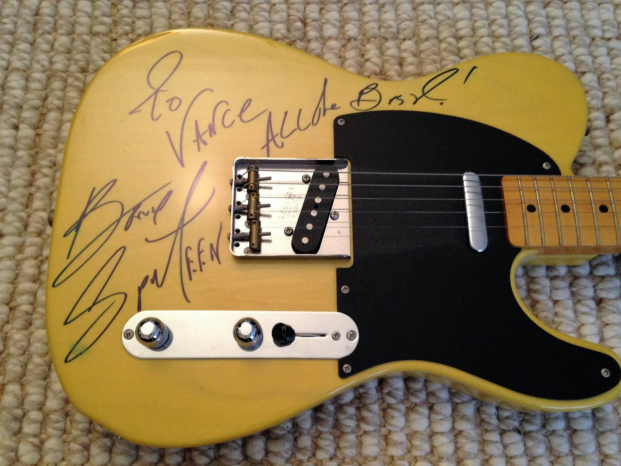 This is a Fender Telecaster, a Japanese reissue, circa 1992. Handsigned by Bruce Springsteen. He Wrote ' To Vance All The Best '. Guitar and Bruce's signature is excellent, a slight rub at the bottom of his S. If you would like the personalization