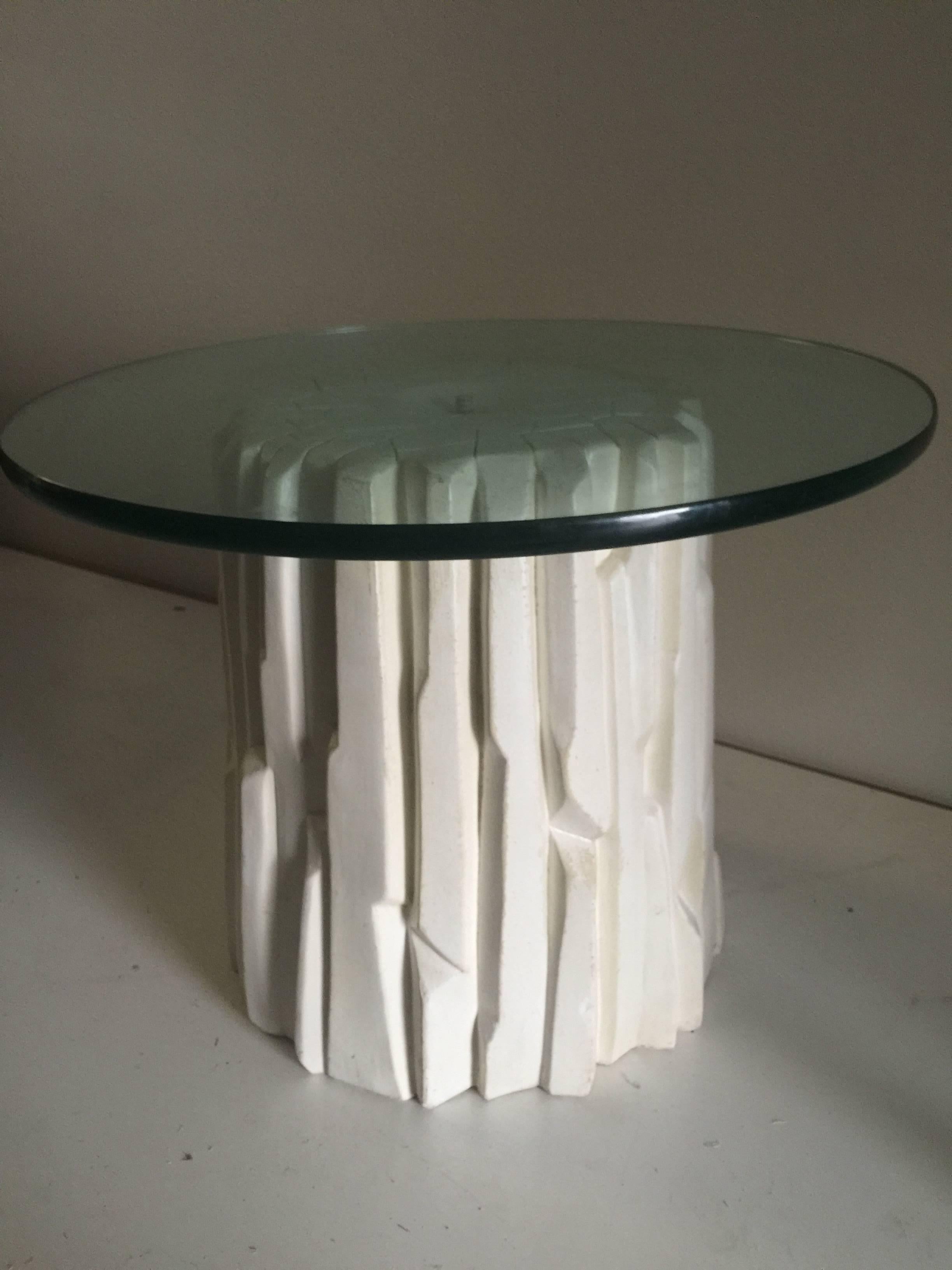 A white, elegant, tree trunk or column occasional or side table with circular glass top in the manner of Serge Roche.