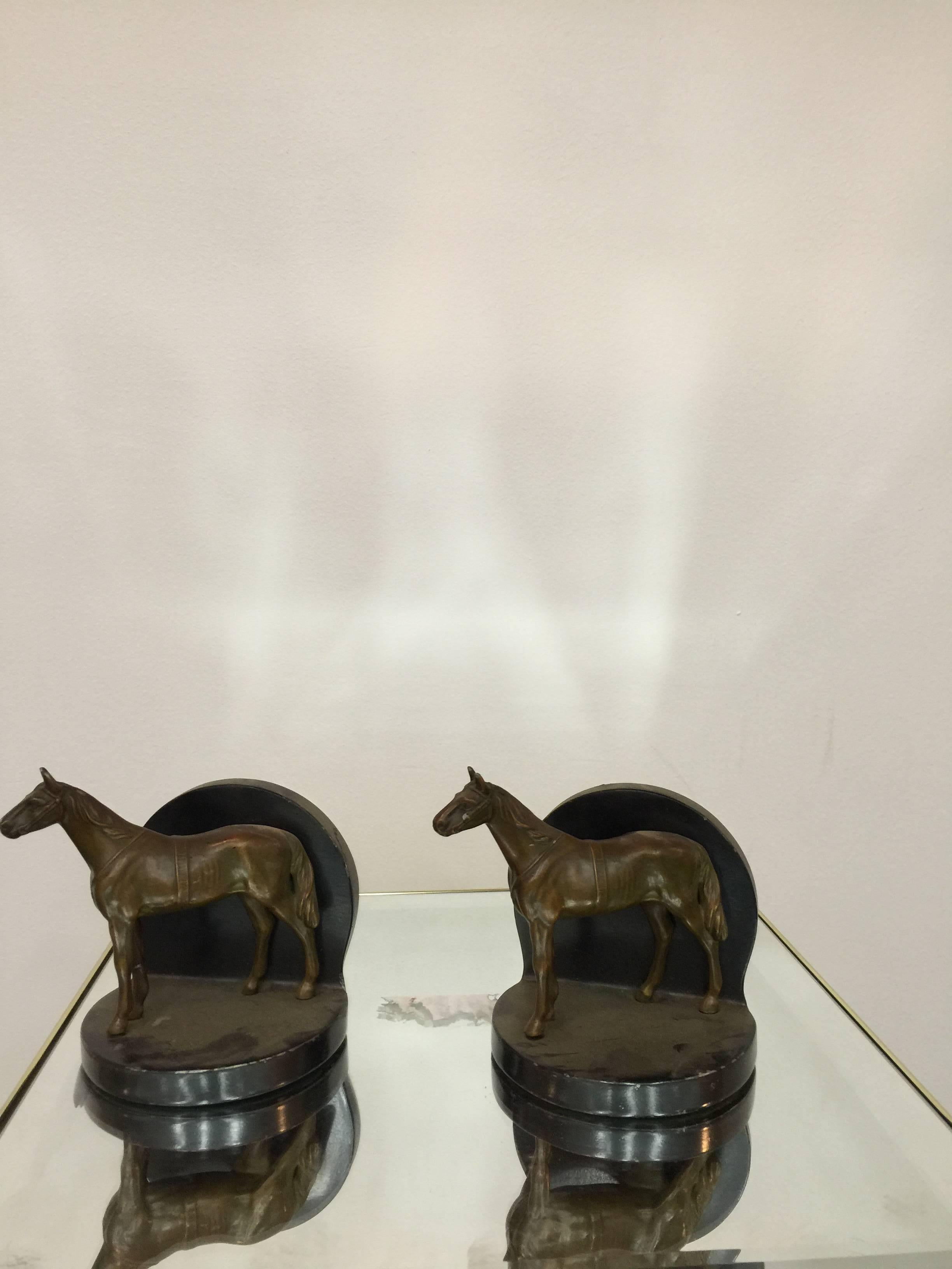 A handsome pair of sculptural horse bronze bookends.