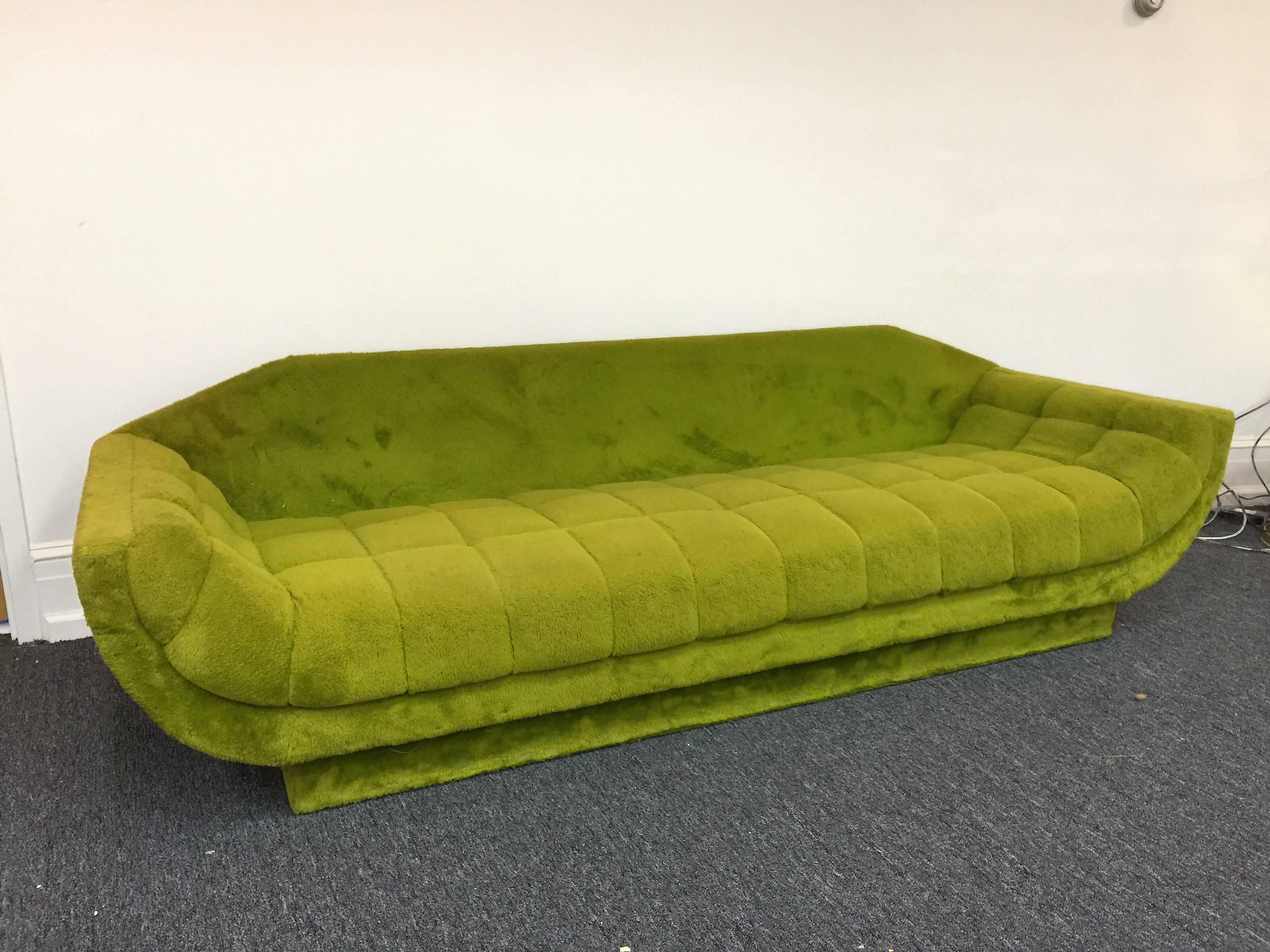 Great shape fabric waffle design upholstered couch made by Adrian Pearsall,
during the 1970s. In Wonderful shape ready to enter a high end modern interior.