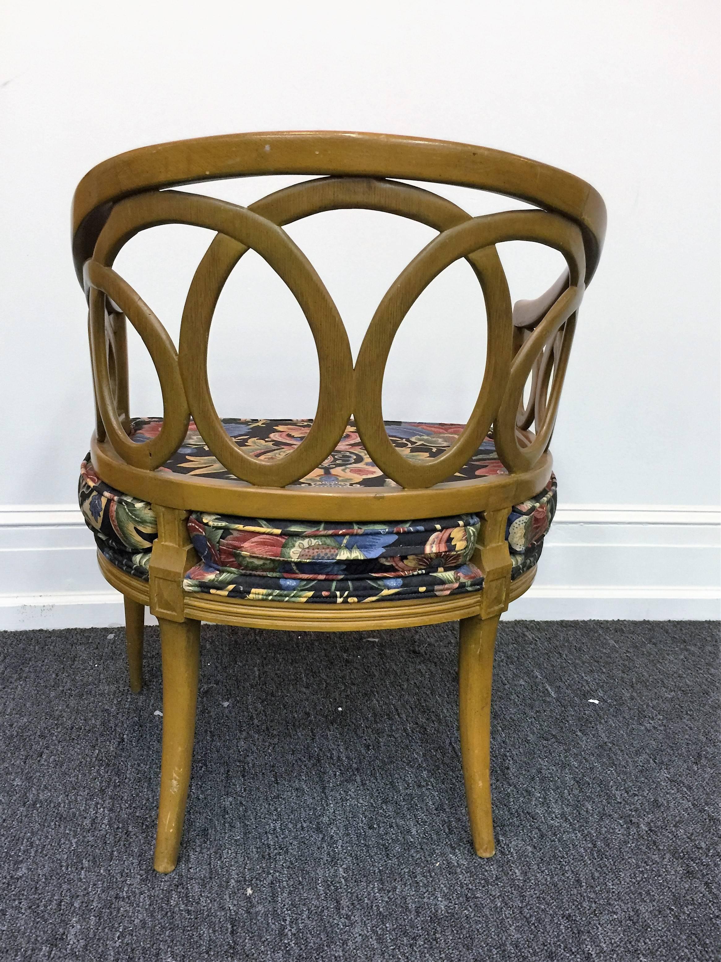 Beautiful fruitwood looped design armchairs in the style of famed British designer Frances Elkins. These Chairs are circa 1960s, perfect for many settings.