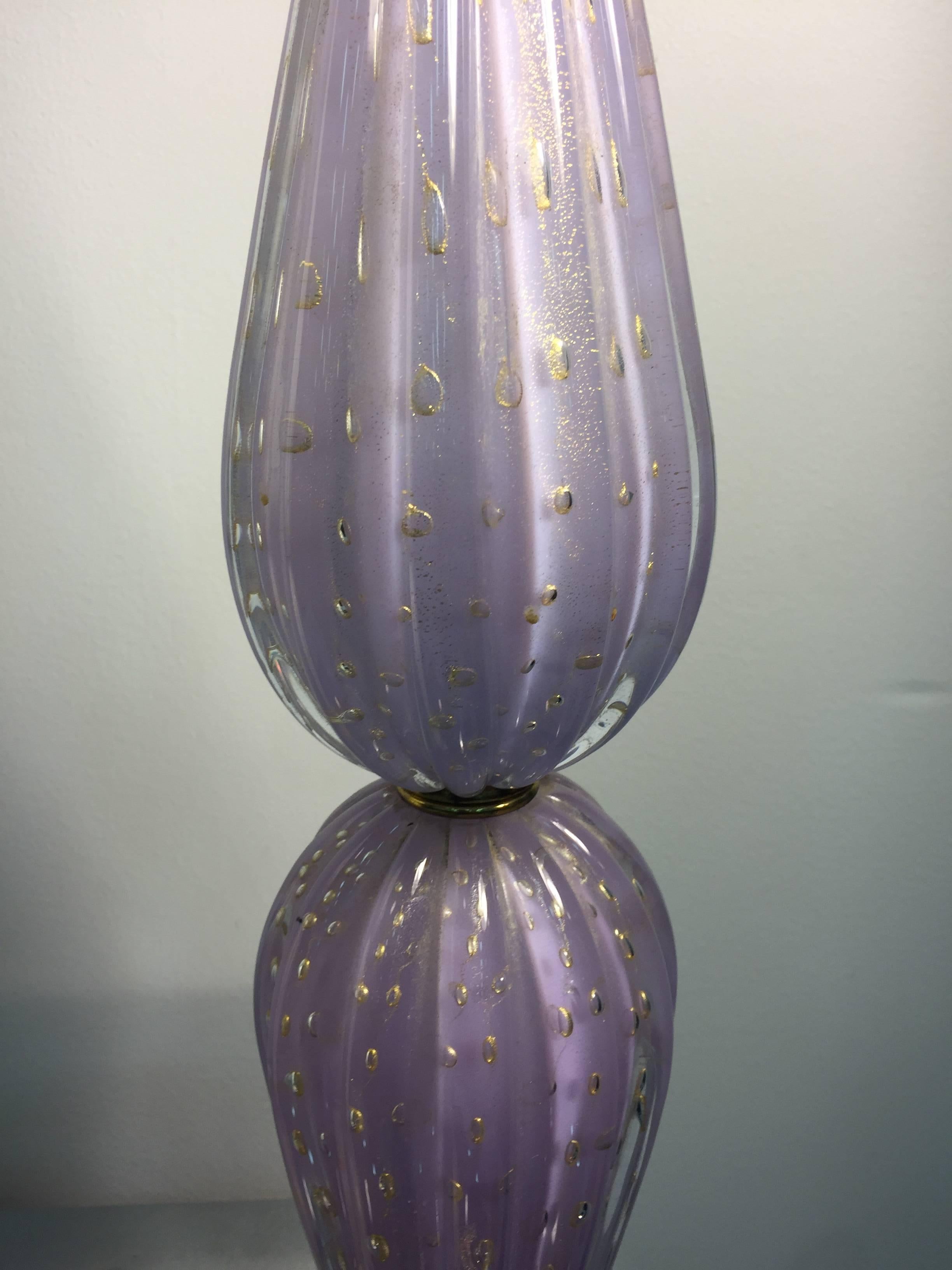 Two terrific table lamps by Barovier & Toso, circa 1960. One lamp is white and the other is purple each with bullicante bubbles and gold inclusions.