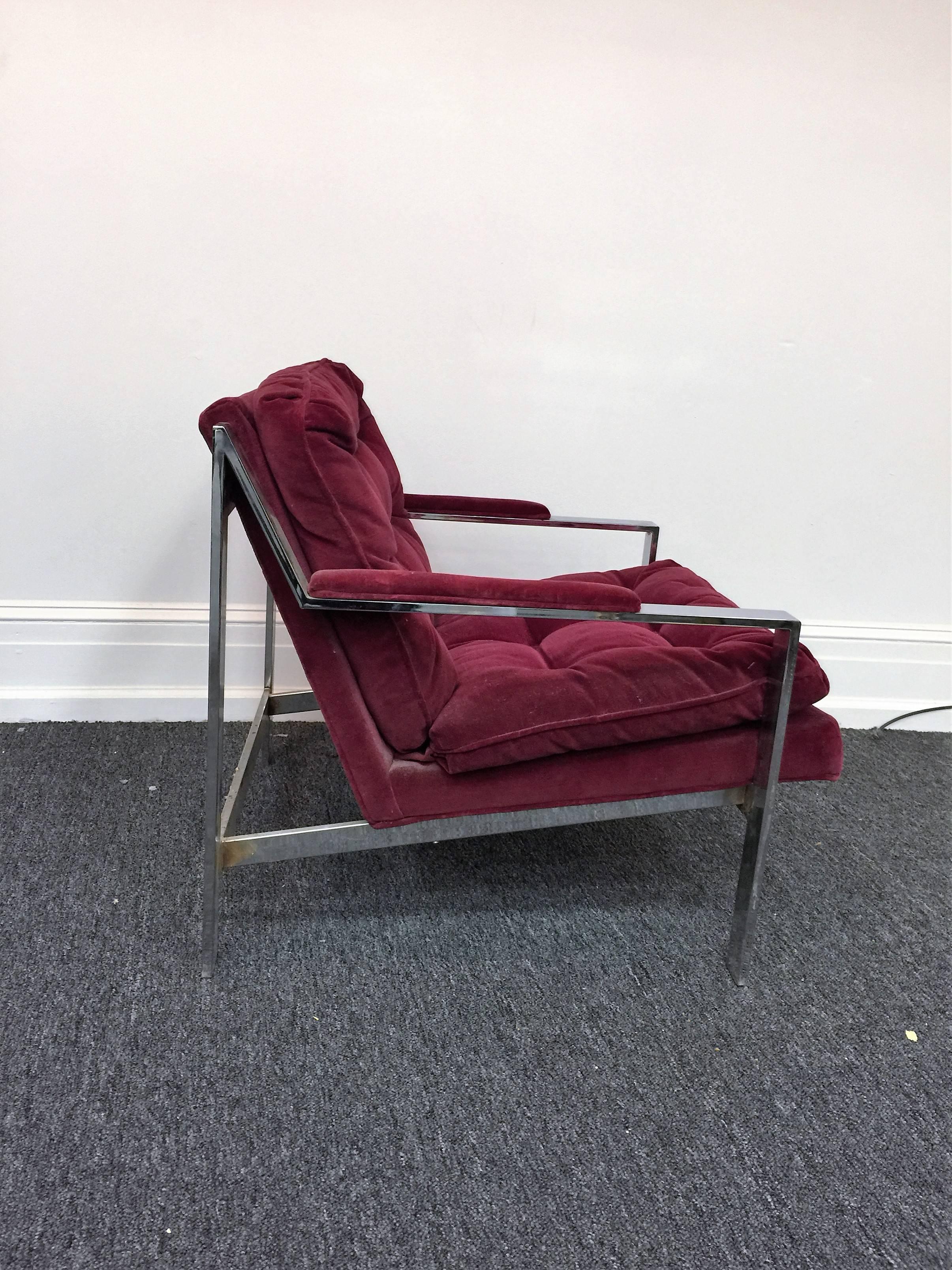 Great 1970s chromed flat band steel armchair with original Burgundy velvet upholstery. Nice addition for your modern interior. The chrome is in perfect condition there is some packing tape on the back bottom chrome band, that looks like chrome