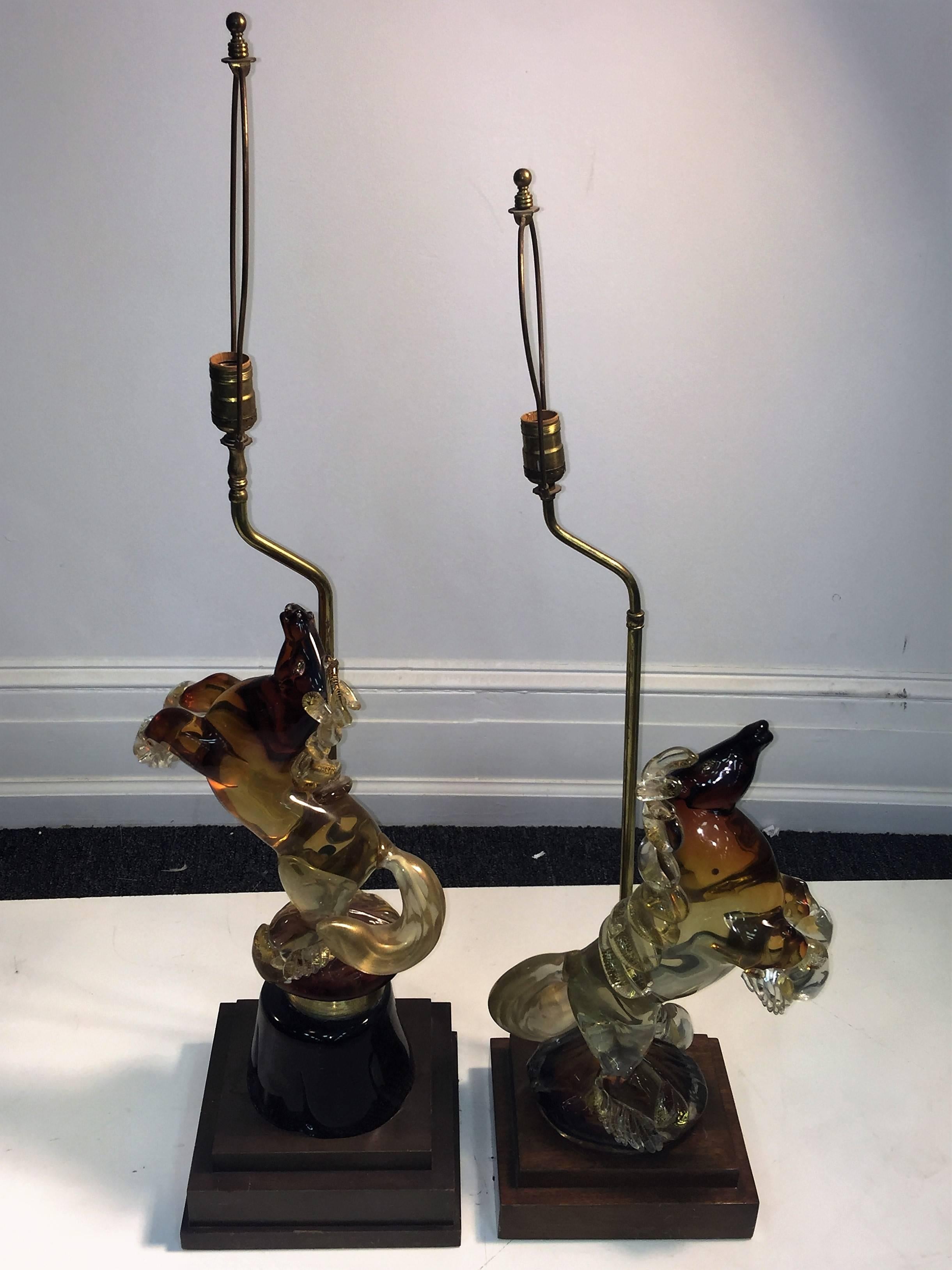1930s-1940s handblown deep amber, yellow and gold infused Murano horses in standing forms. Each one formed differently so together they become an interesting art sculptural pair of great masterpieces blown by the Italian glass Master Alfredo