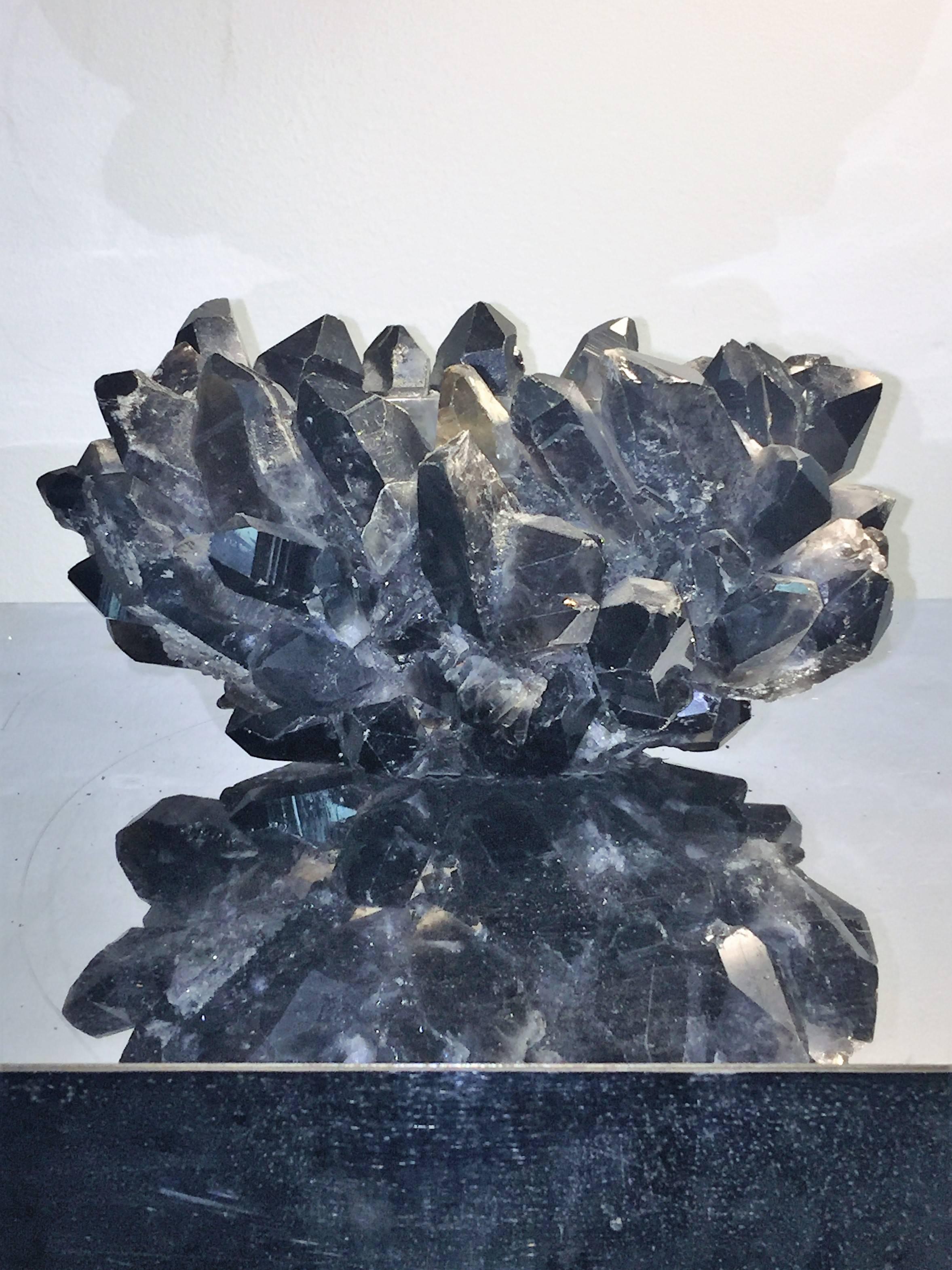 Great jagged black quartz bowl with glass bowl interior. Decorated with great impressive crystals this bowl catches the sunlight and is a really beautiful decorative object. Graced with a metal tag that reads McCoy design.